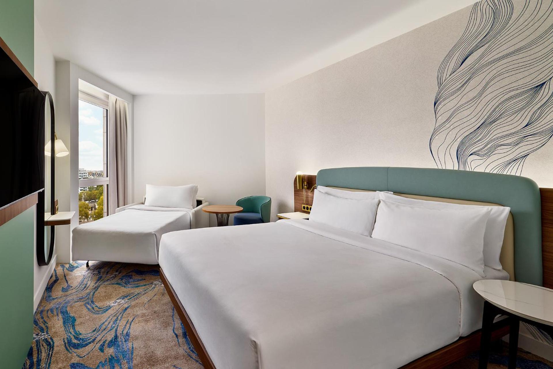 Superior Triple King Room with Sofa Bed photo 3