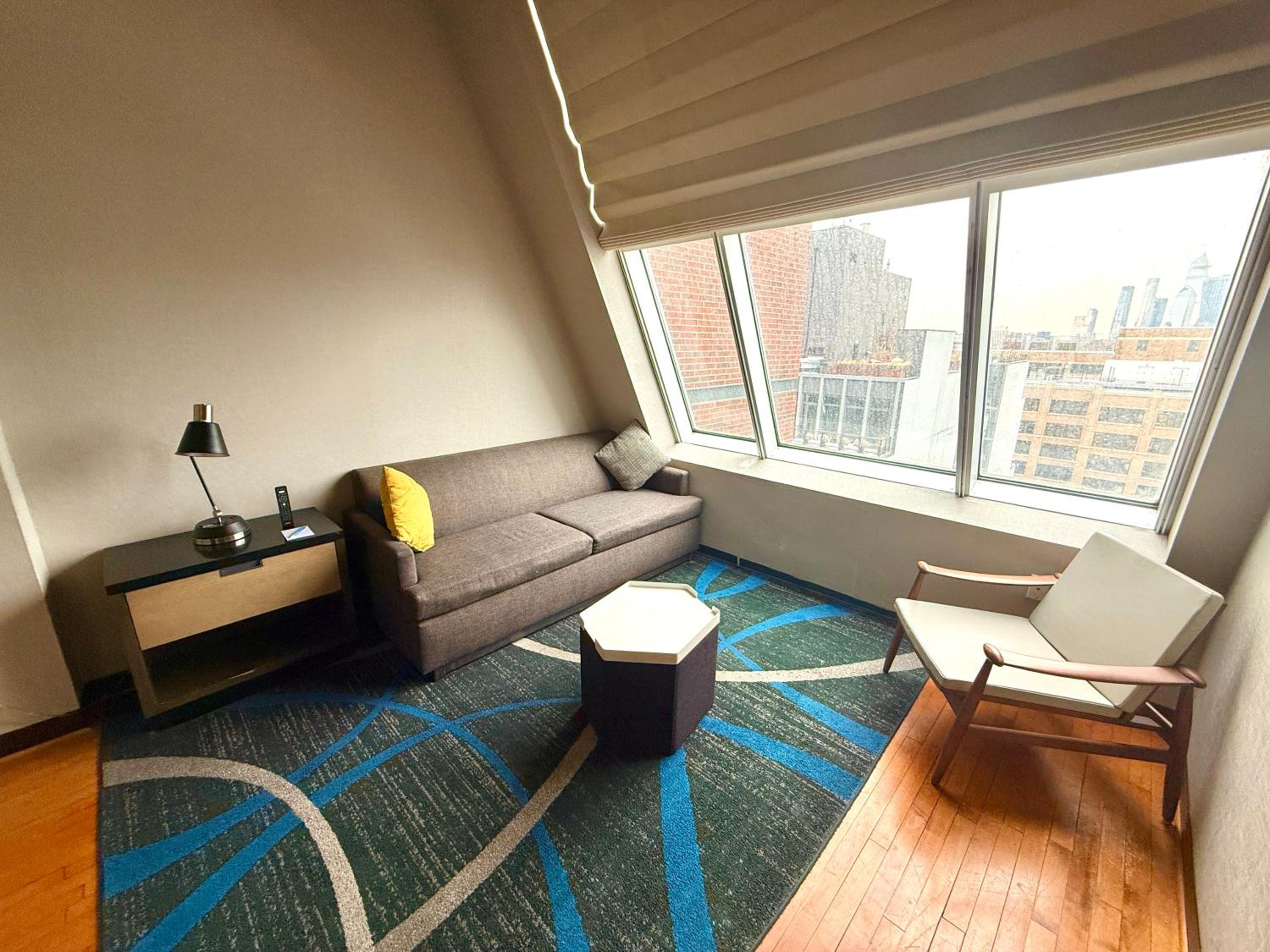 King Suite with Sofa Bed and Skyline View - High Floor