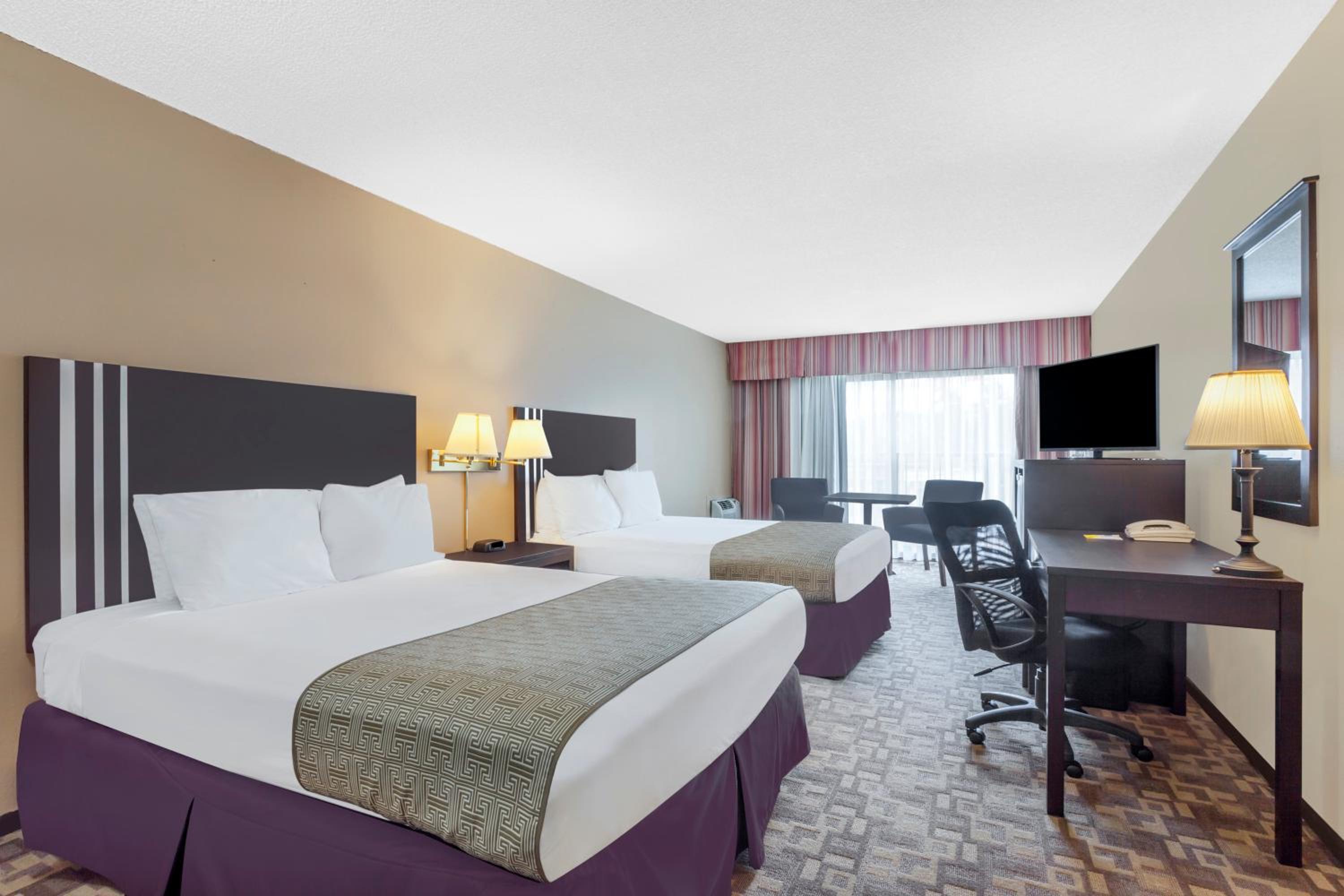 Deluxe Queen Room with Two Queen Beds - Non-Smoking photo 1