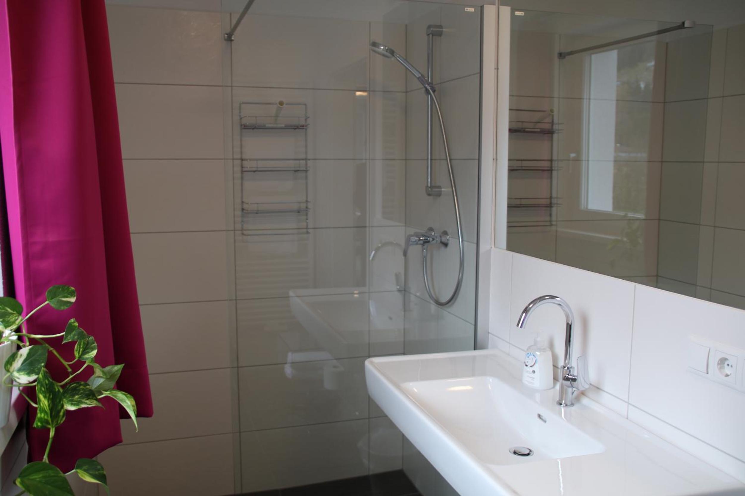 Three-Bedroom Apartment - Photo 19