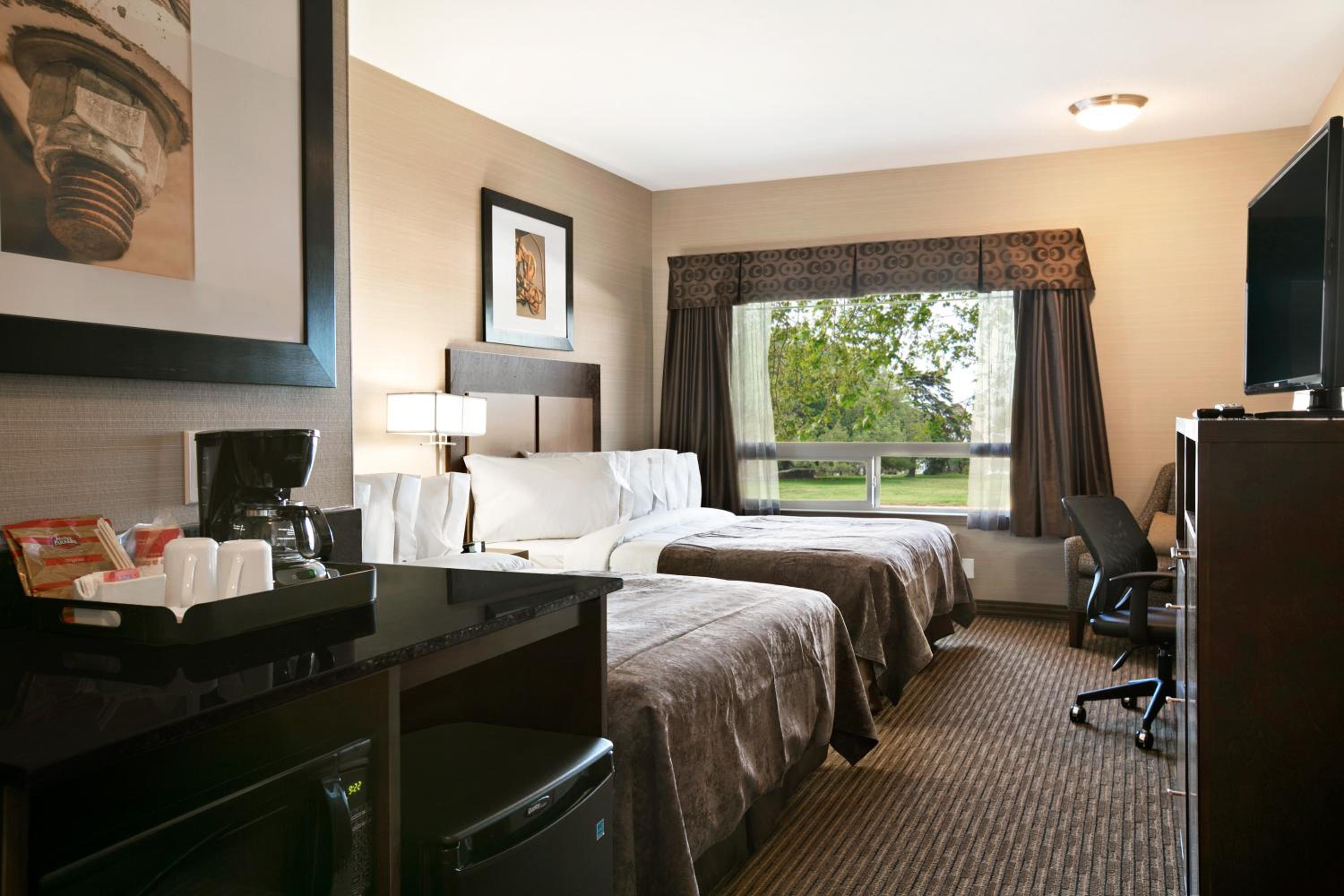 Deluxe Queen Room with Two Queen Beds - Non-Smoking photo 1