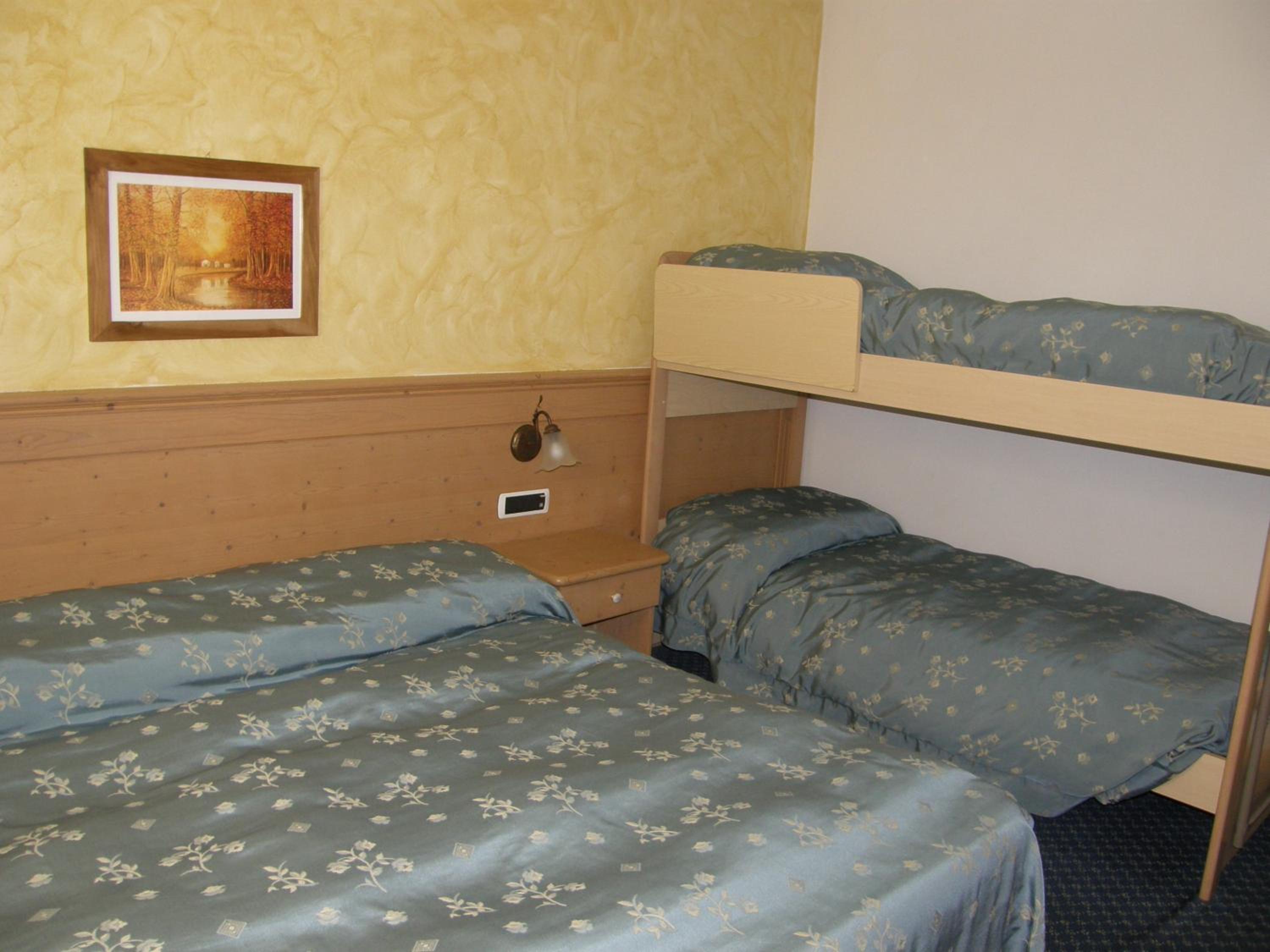 Quadruple Room with Private Bathroom