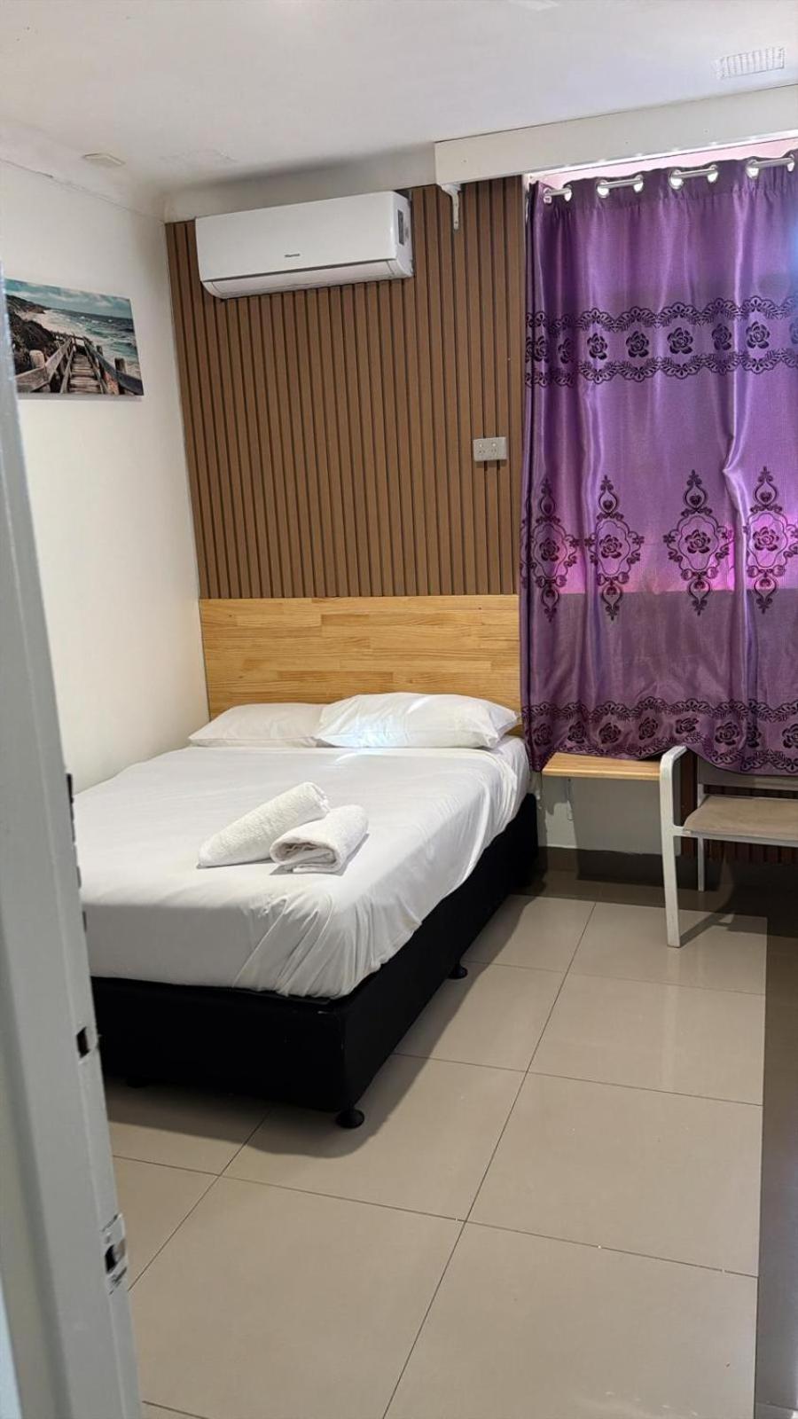 Single Room with Shared Shower and Toilet