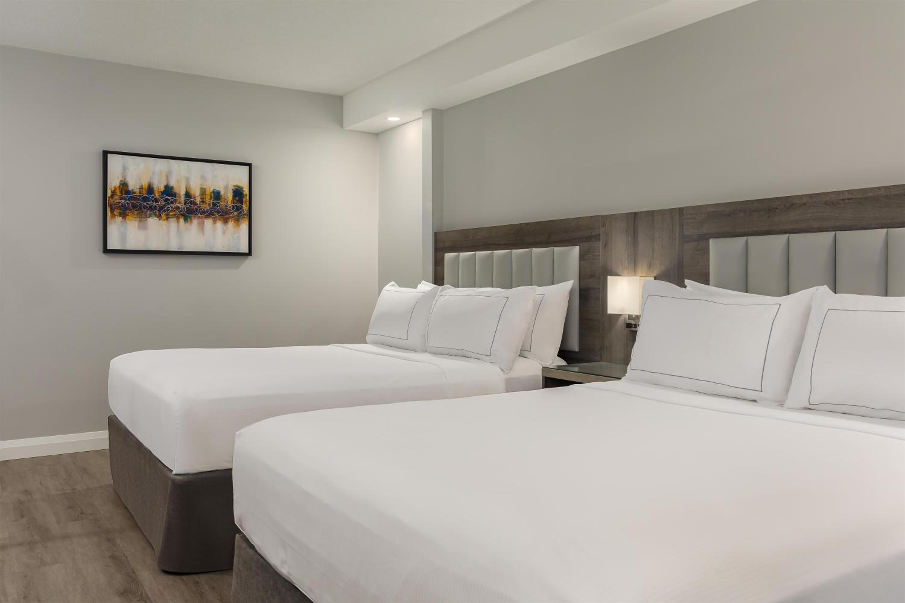 Queen Suite with Two Queen Beds and Living Room