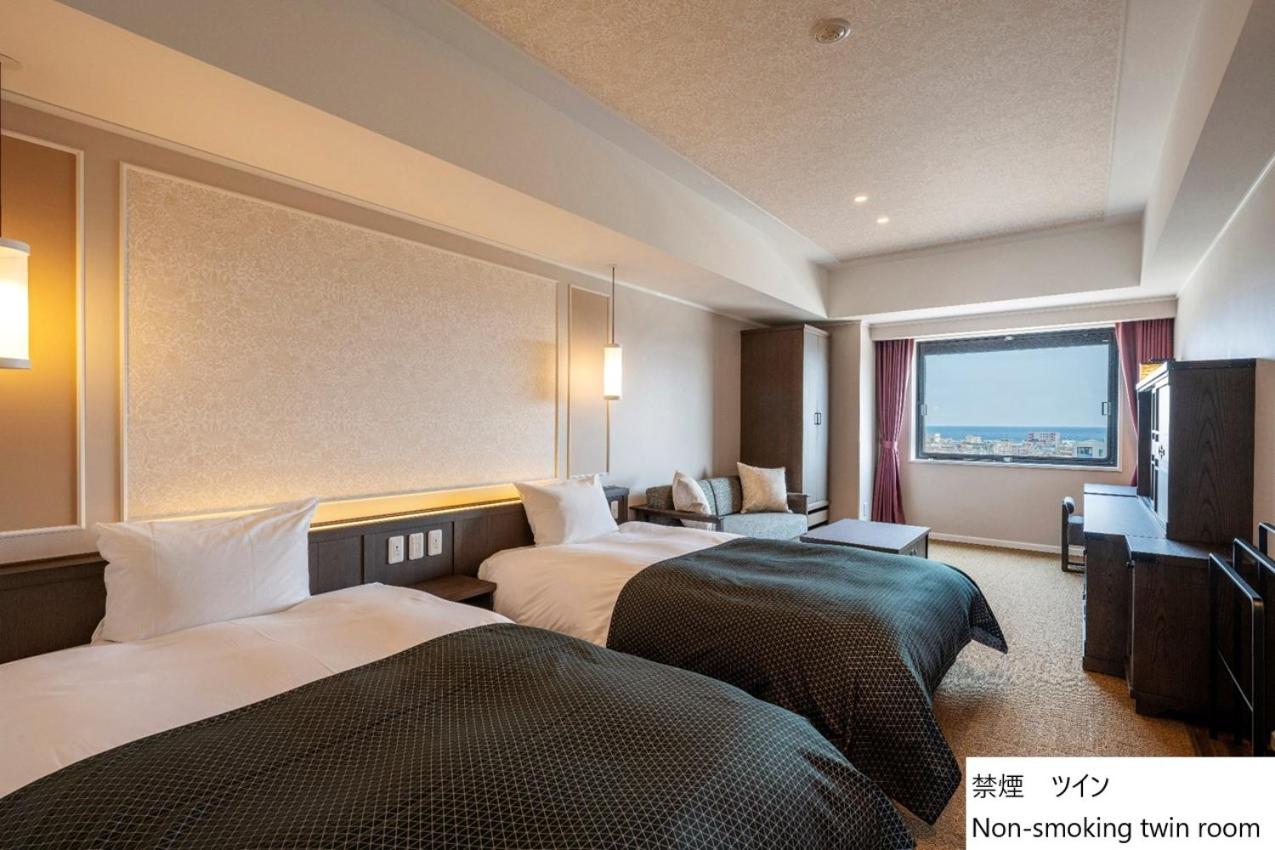 Standard Twin Room - Photo 4