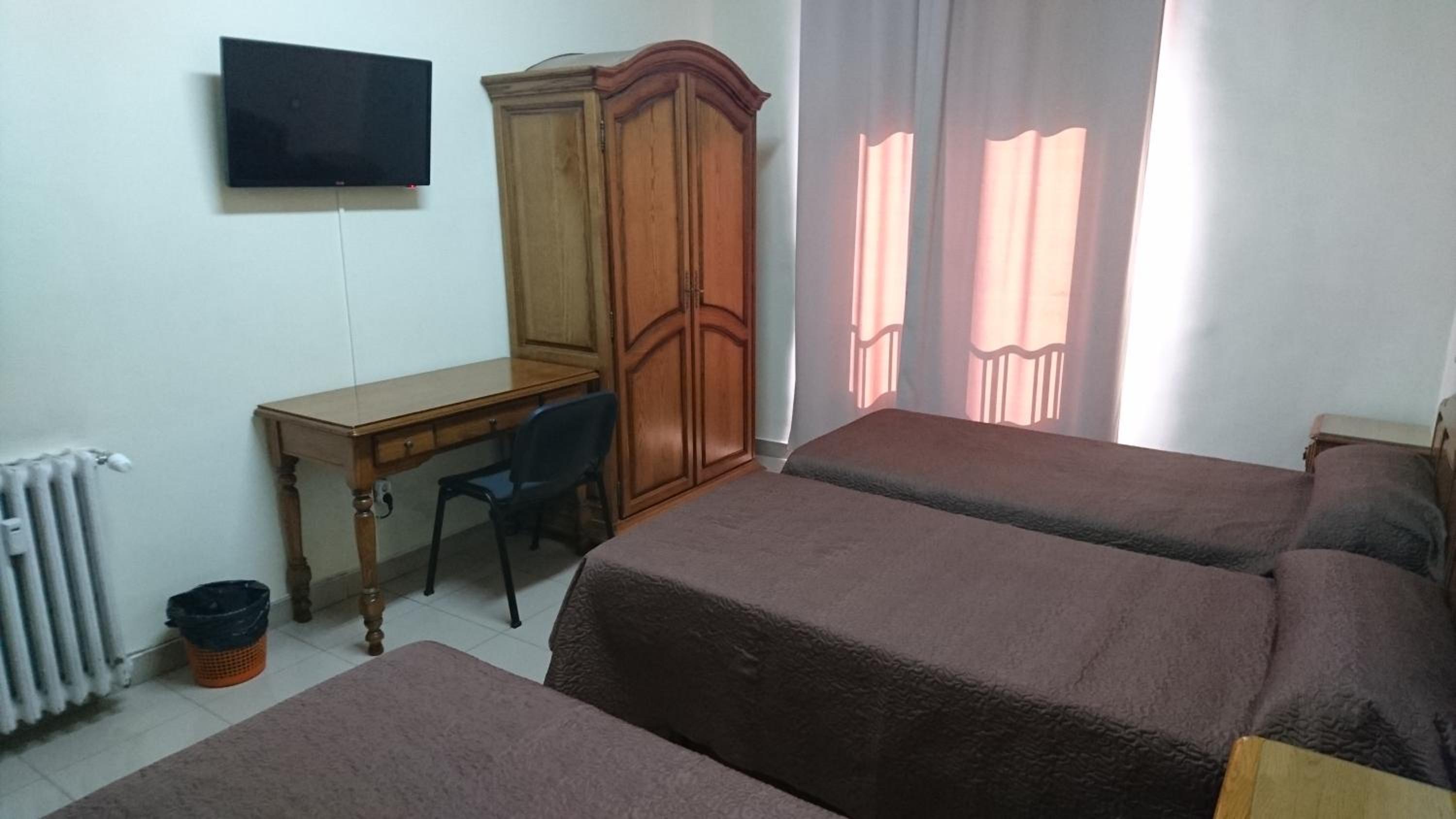 Triple Room - Photo 12