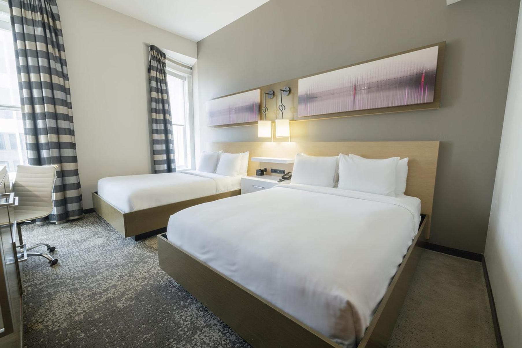 Standard Queen Room with Two Queen Beds and Mobility Accessible Tub photo 2