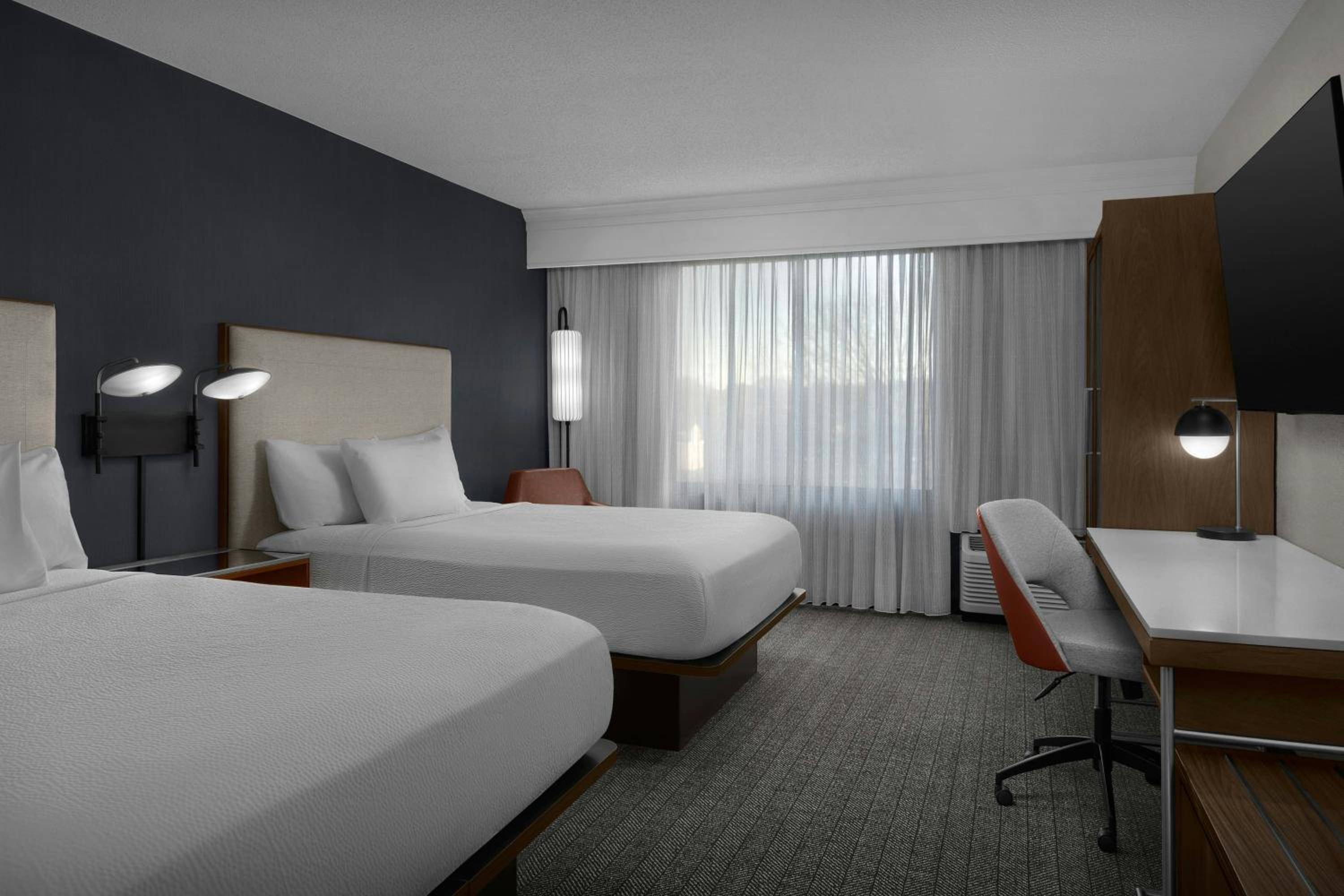 Queen Room with Two Queen Beds - Photo 1
