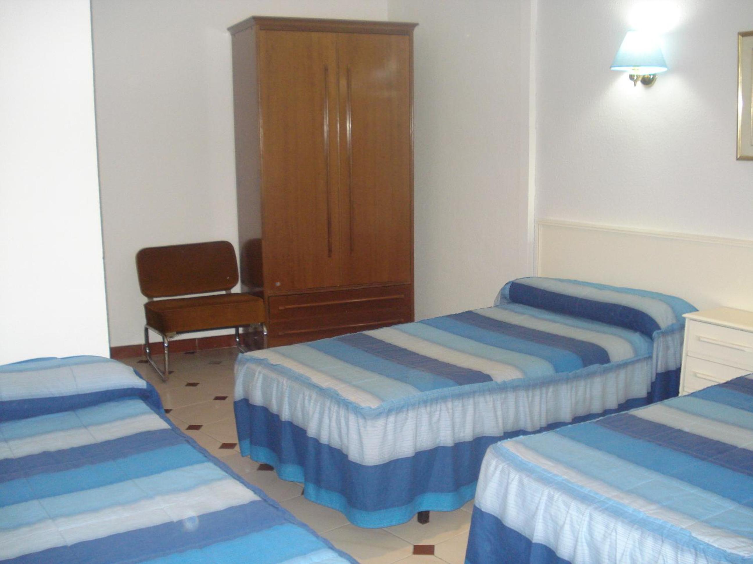 Habitación Triple con Baño Privado