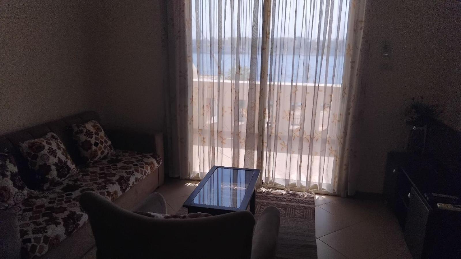 One-Bedroom Apartment with Balcony and Water View photo 2