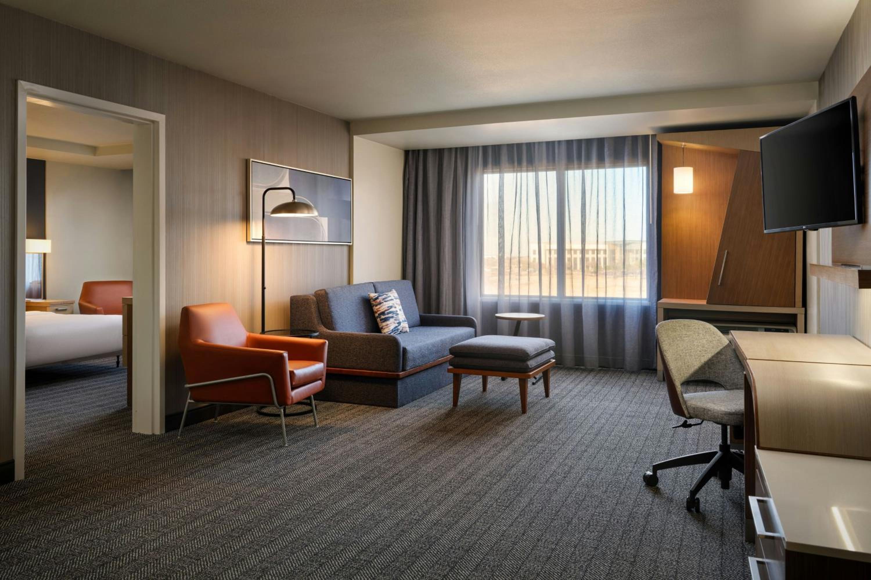 One-Bedroom King Suite with Roll-In Shower and Sofa Bed - Mobility Access/Hearing Accessible