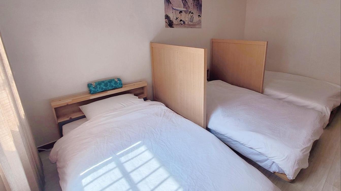 Single Bed in Female Dormitory Room