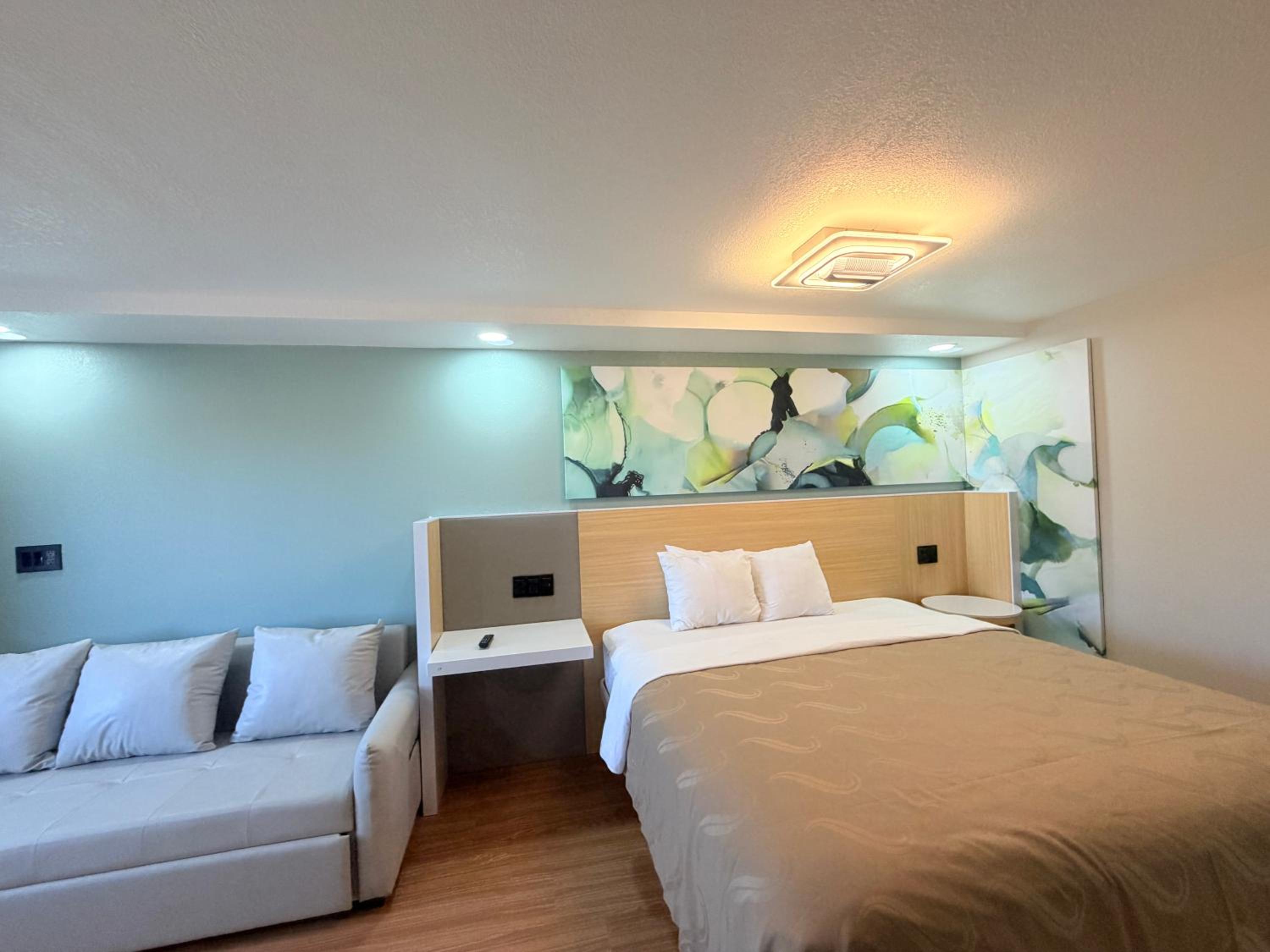 Deluxe King Room with Sofa Bed