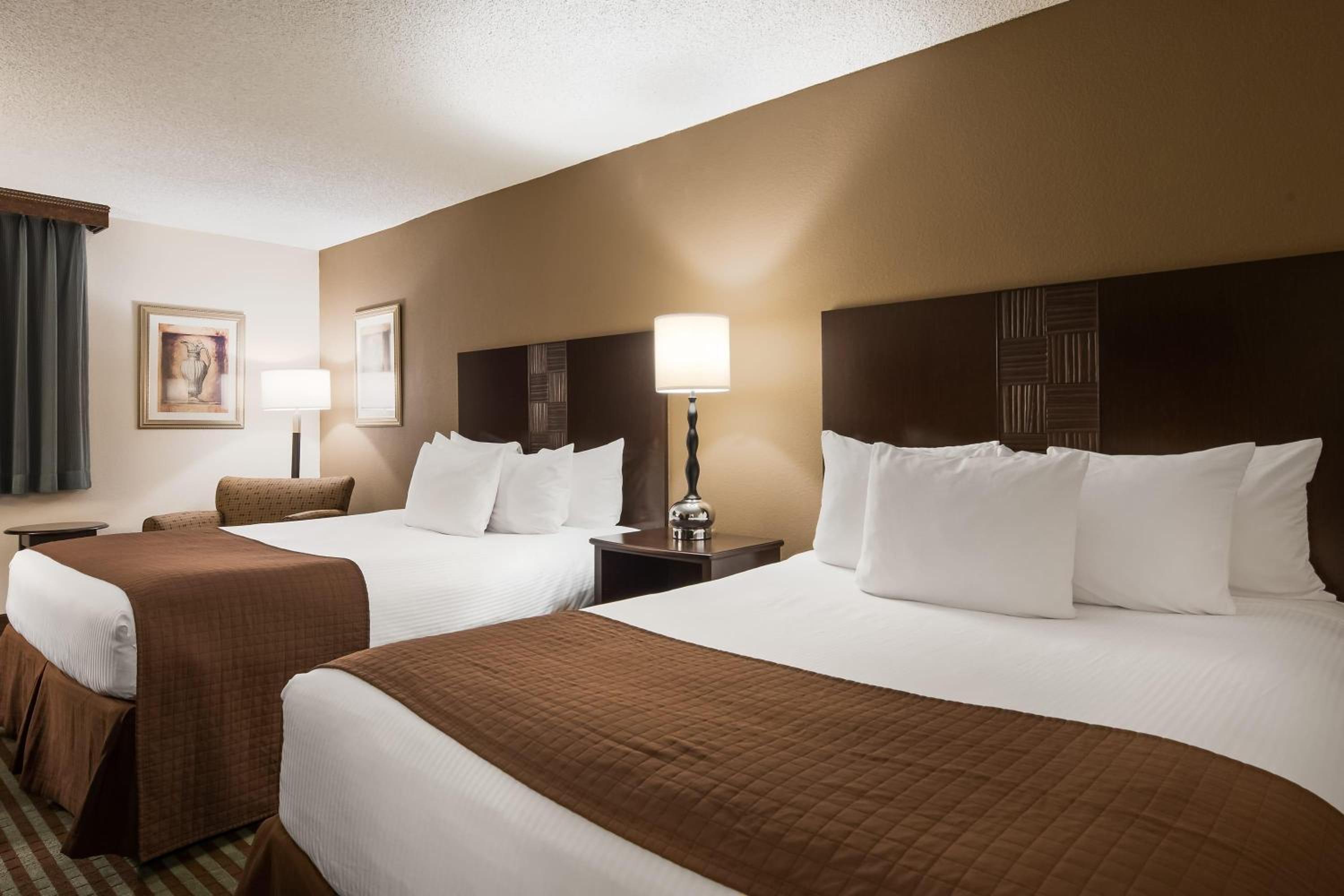 Deluxe Queen Room with Two Queen Beds - Non-Smoking photo 1