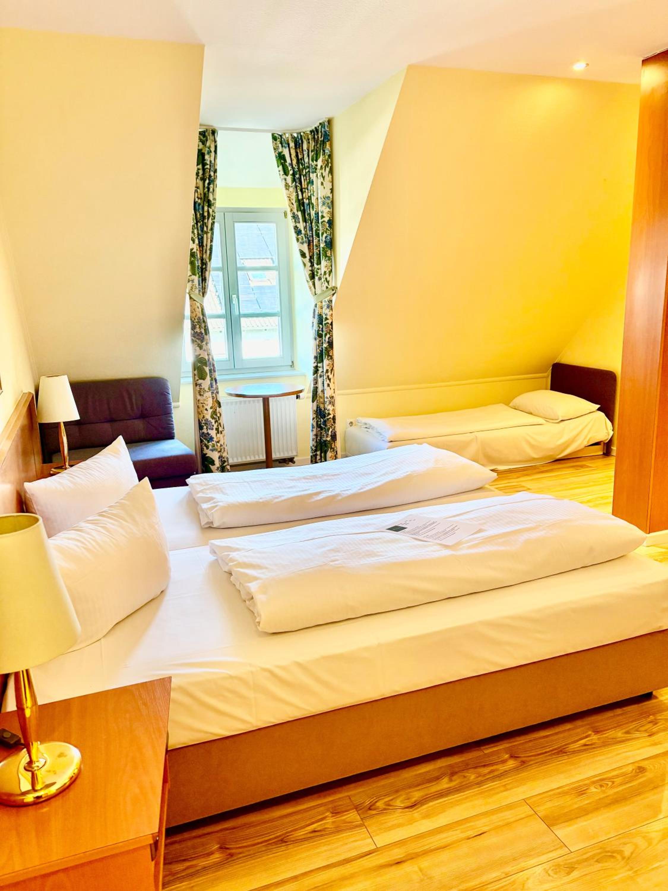 Quadruple Room with Shared Bathroom