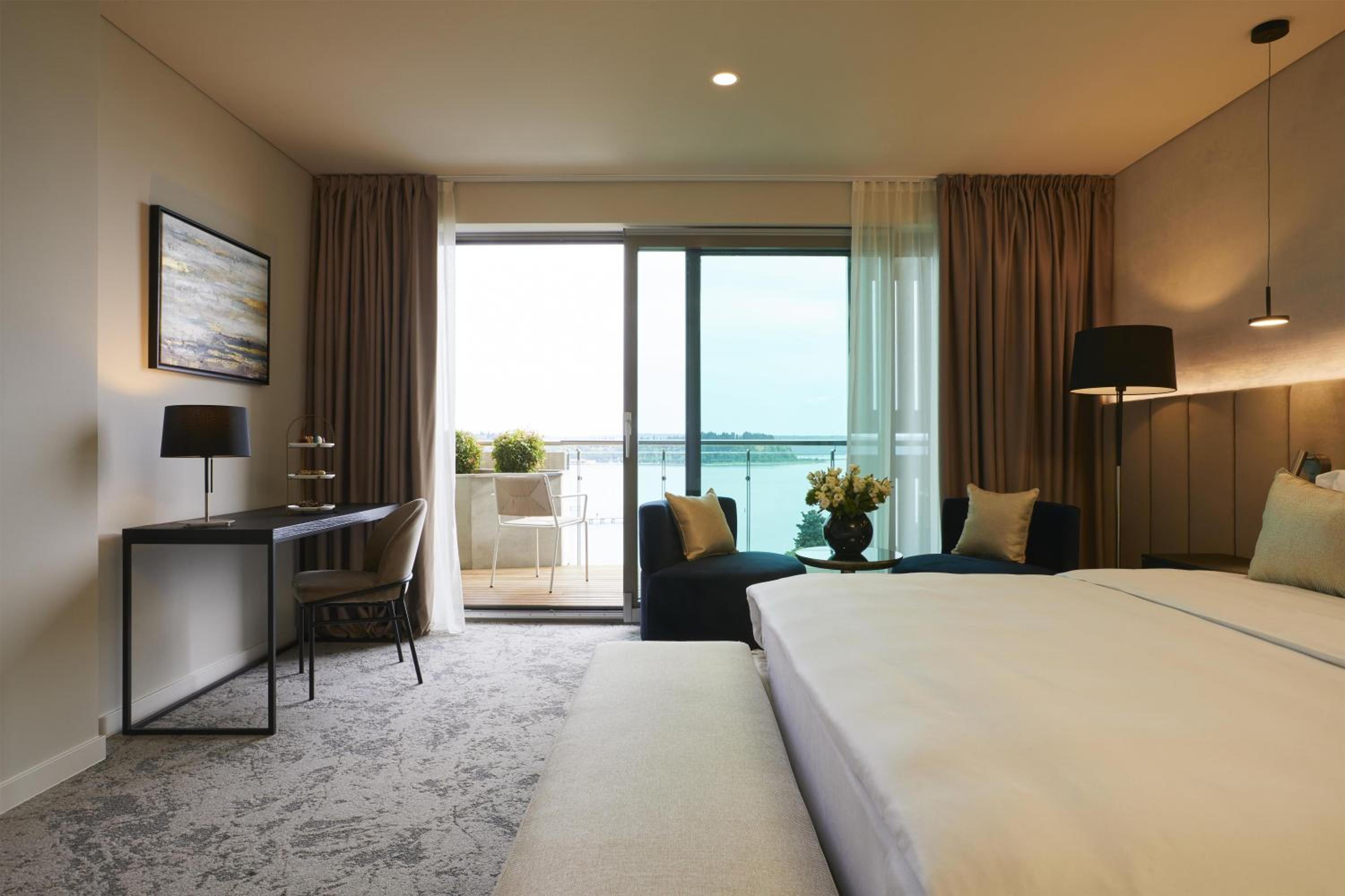 Grand Deluxe Terrace Sea View with Extra Bed (2 Adults + 2 Child)