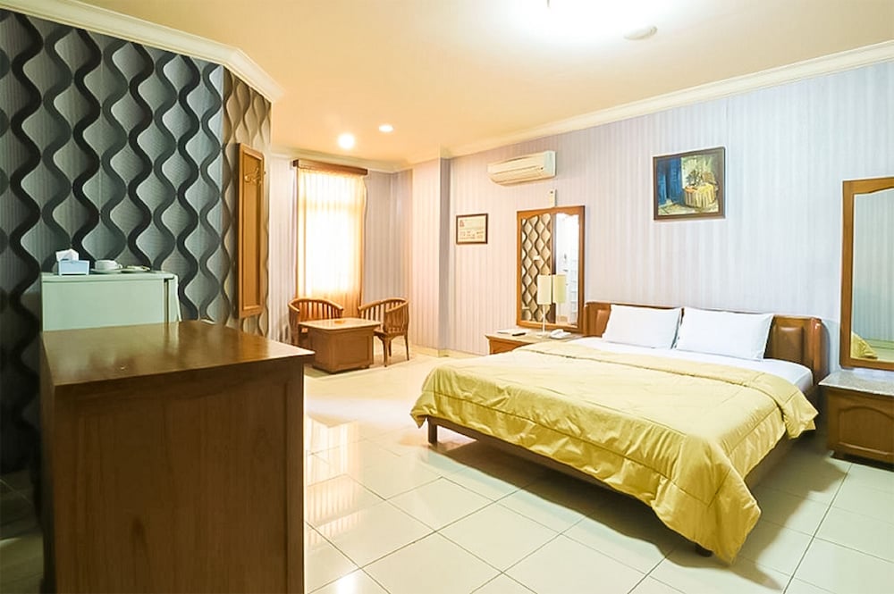 Deluxe Room - Photo 4