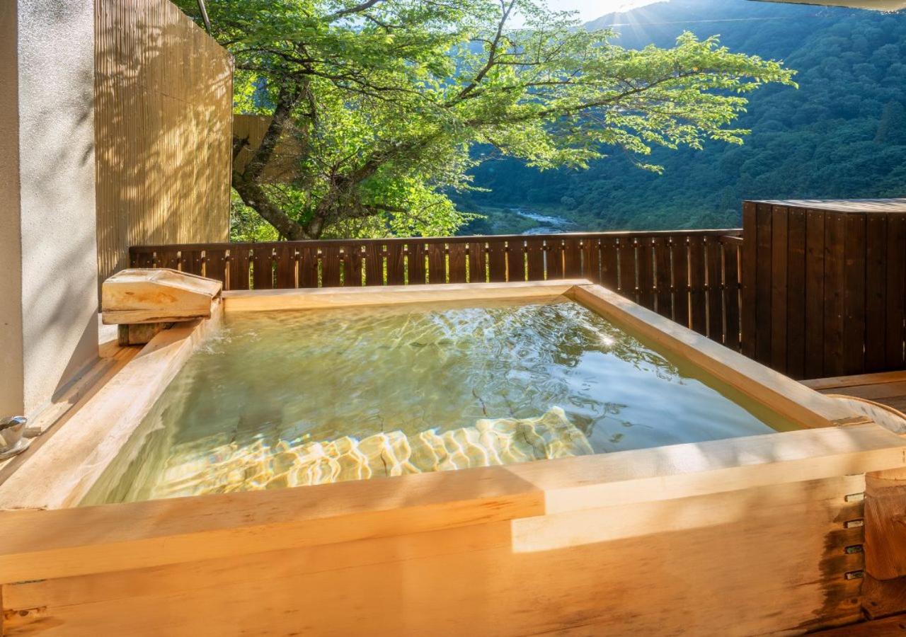 Twin Room with Tatami Area and Open-Air Bath - Non-Smoking photo 1