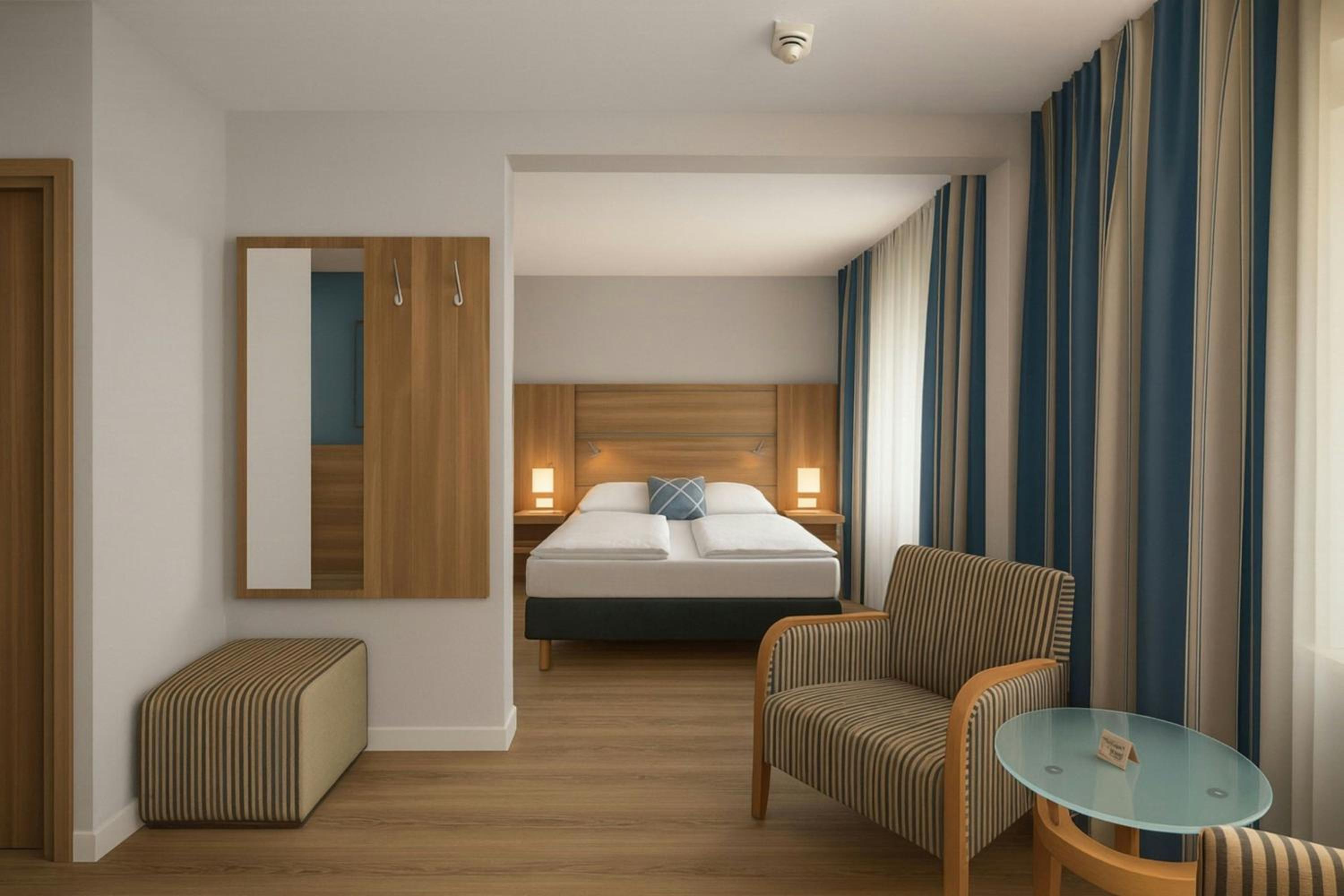 Standard Family Room with Two Single Beds and Sofa Bed - Photo 1