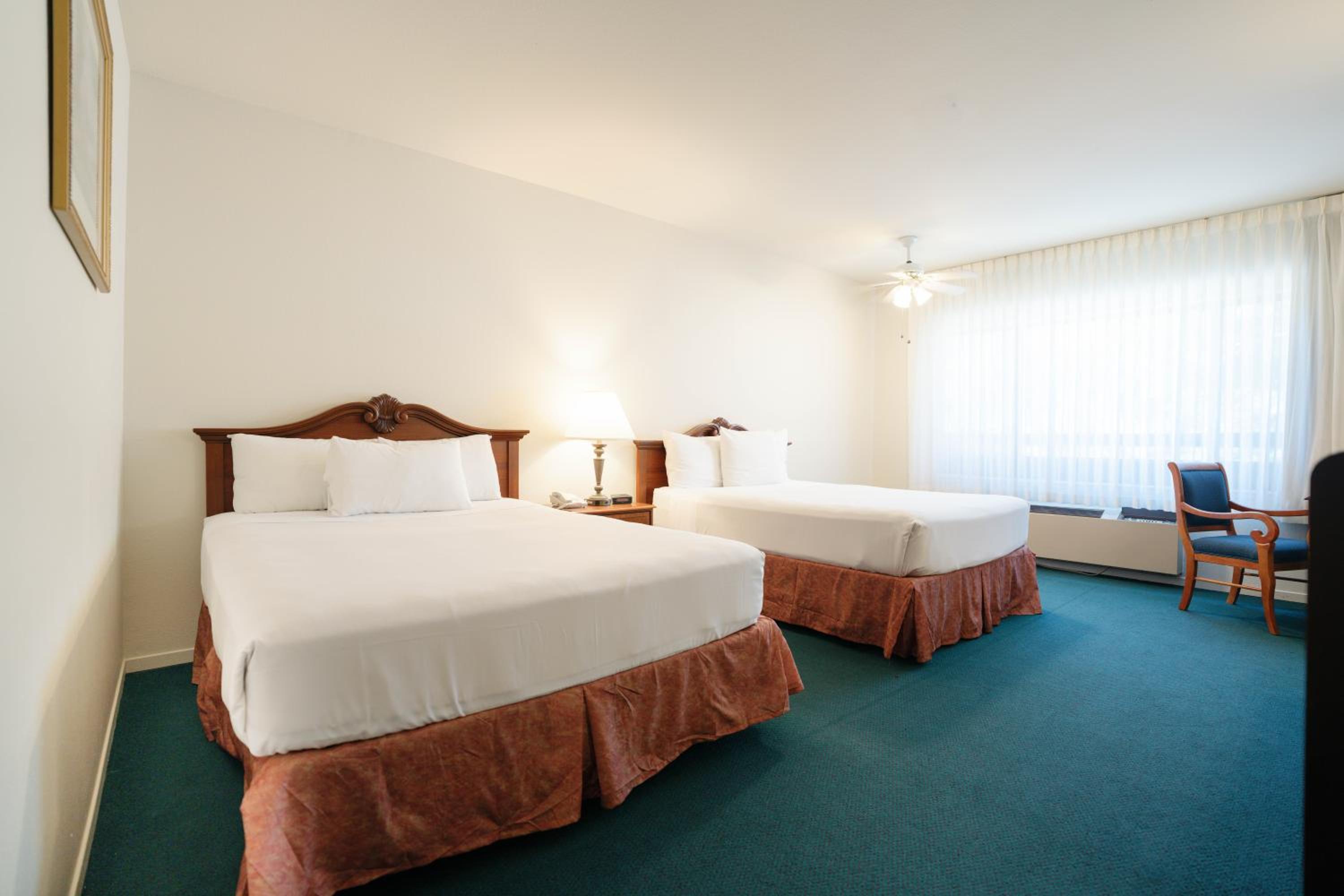 Queen Room with Two Queen Beds - Photo 1