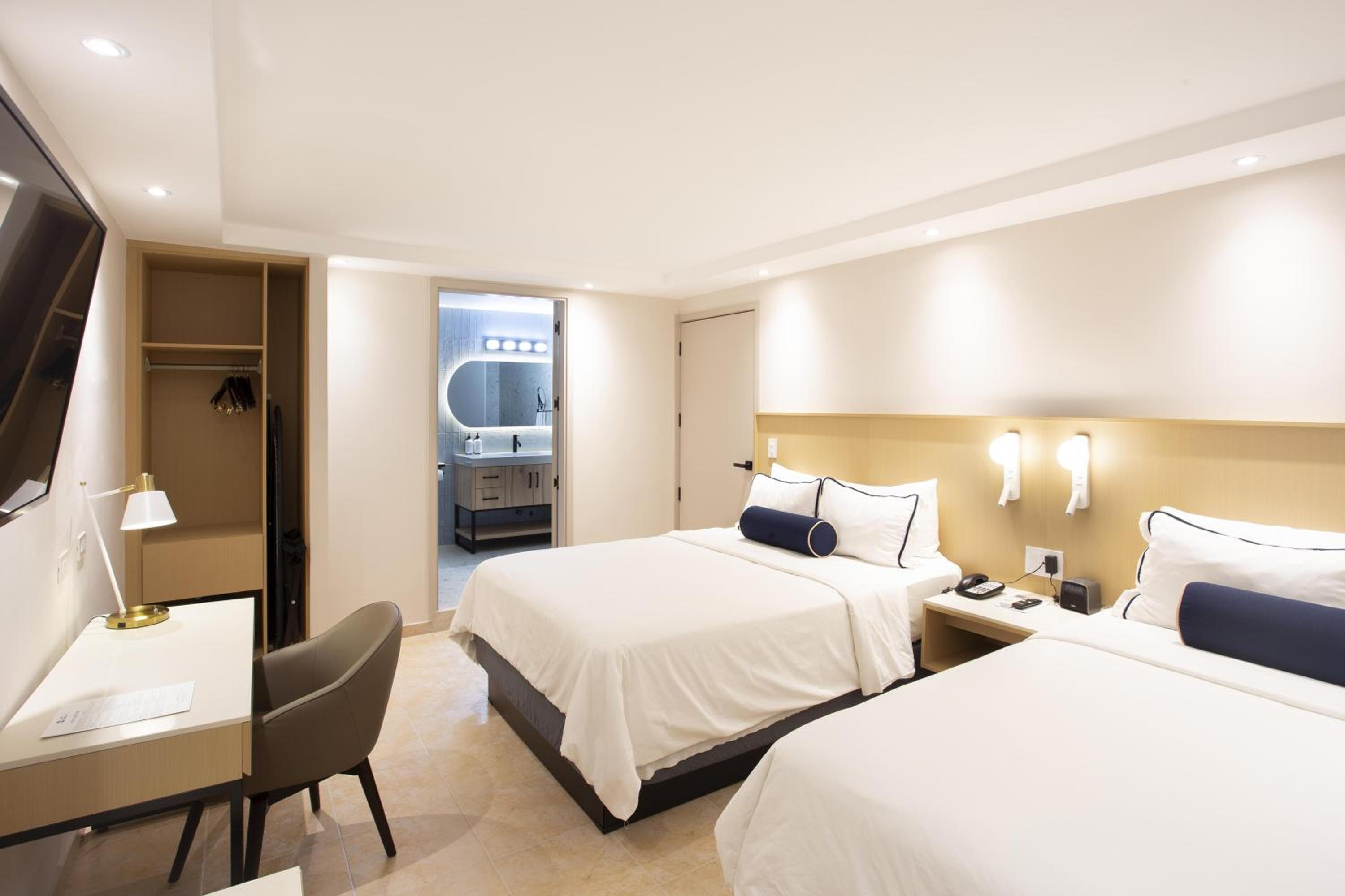 Queen Suite with Two Queen Beds, Sofa Bed and Living Room - Non-Smoking
