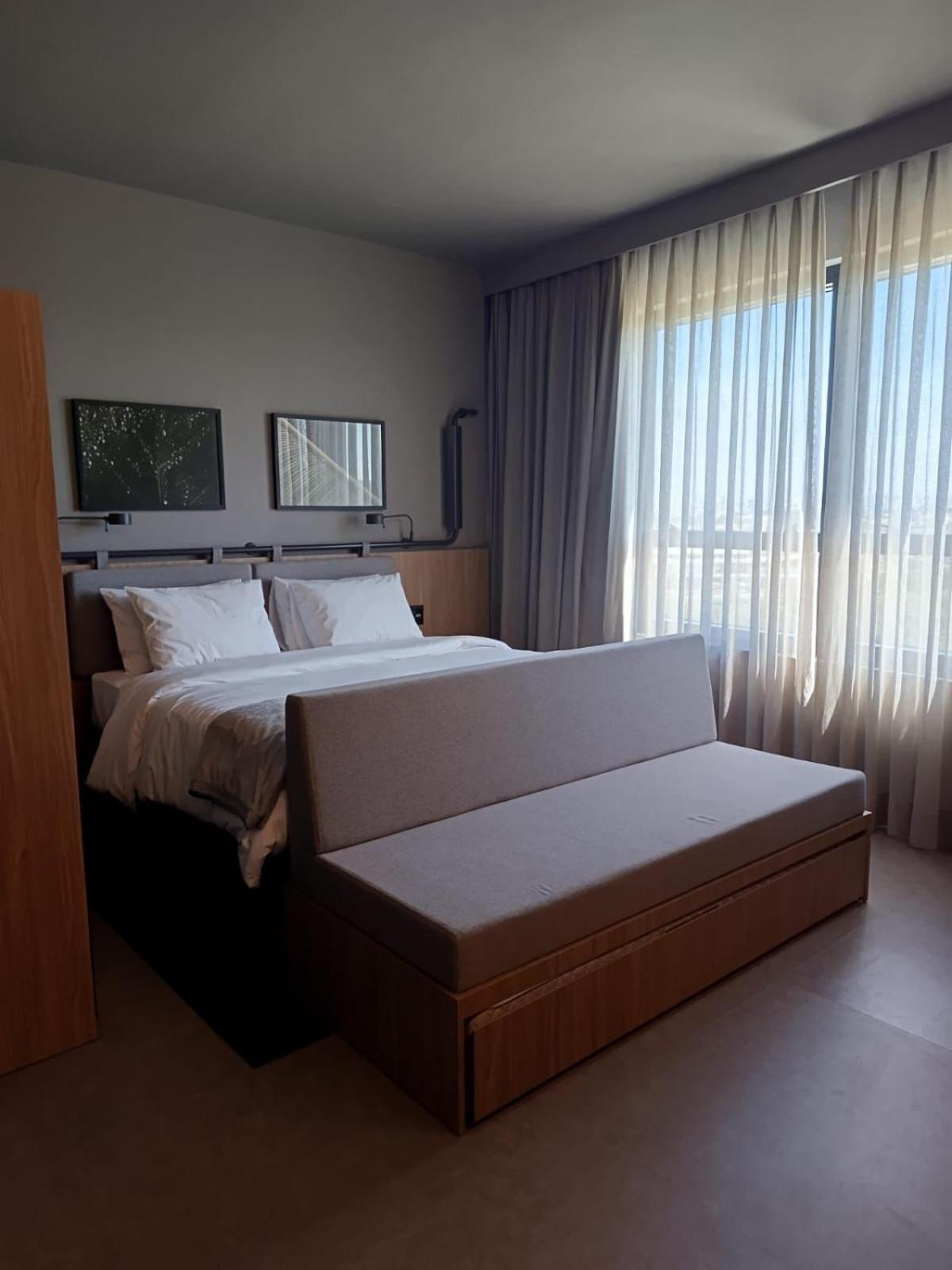 Superior room with one King Bed and one sofa bed