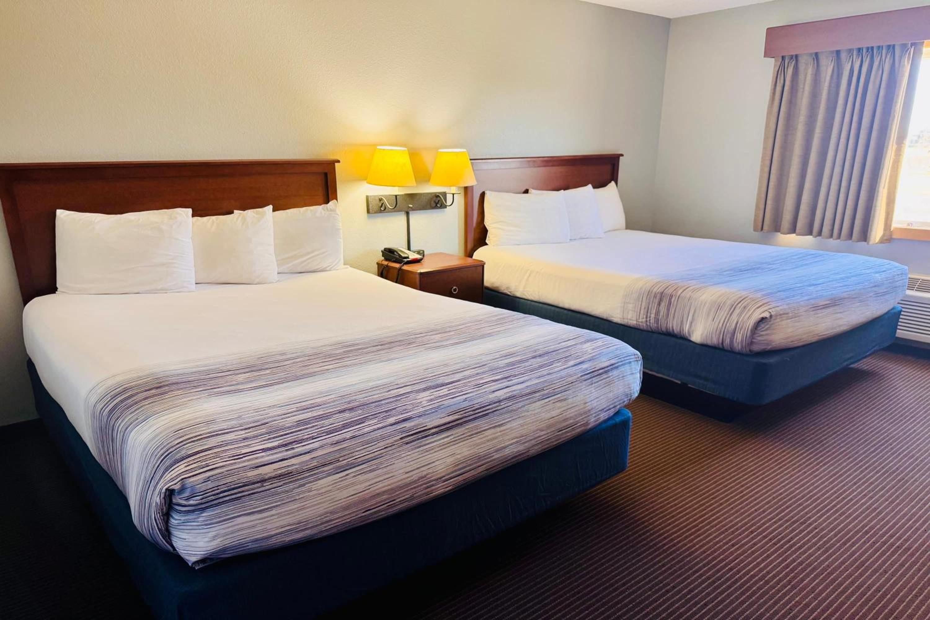 Queen Room with Two Queen Beds - Dog Friendly/Non-Smoking - Photo 1