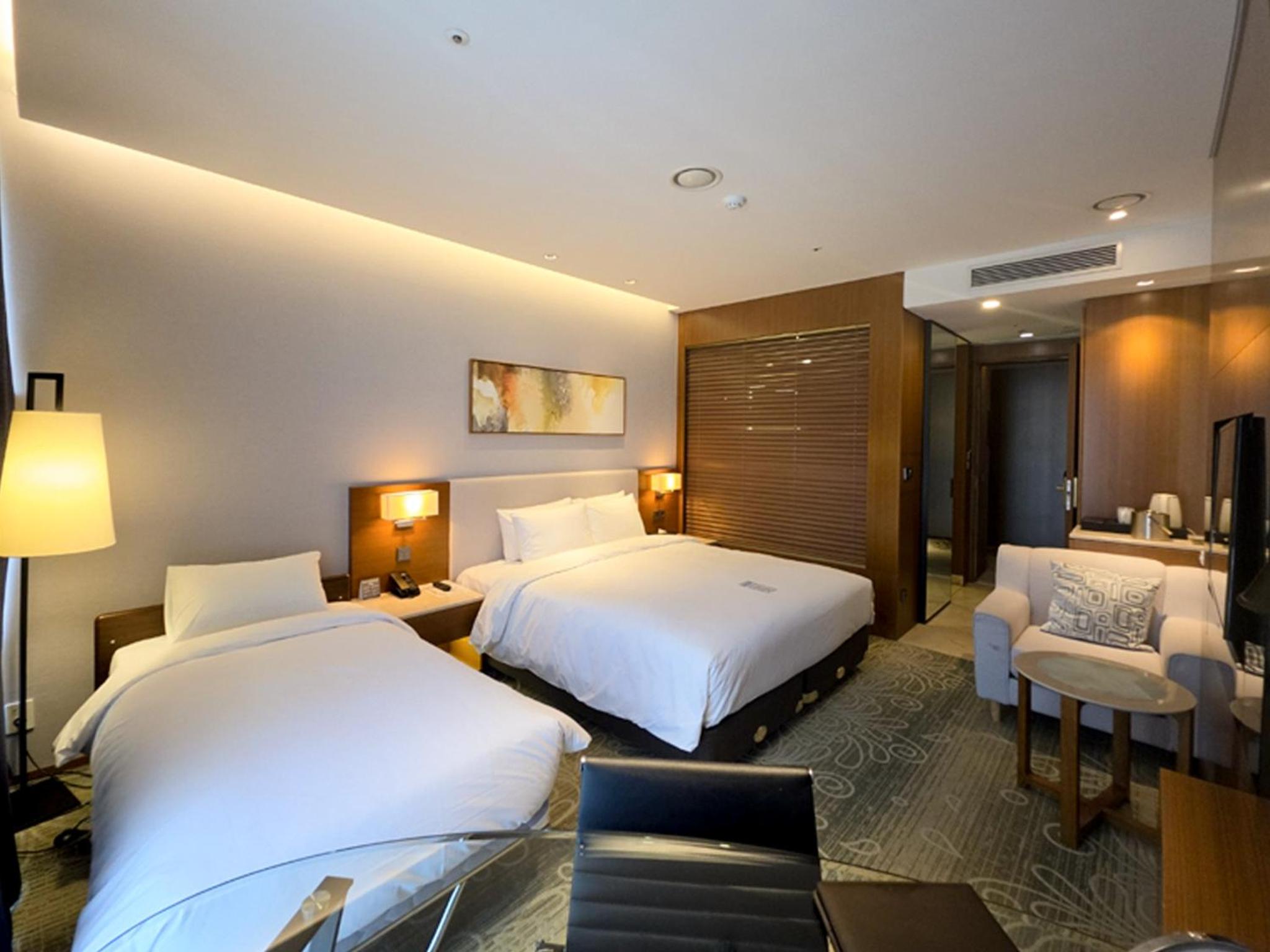 Semi Deluxe Twin (1 Double Bed + 1 Extra Bed) photo 2