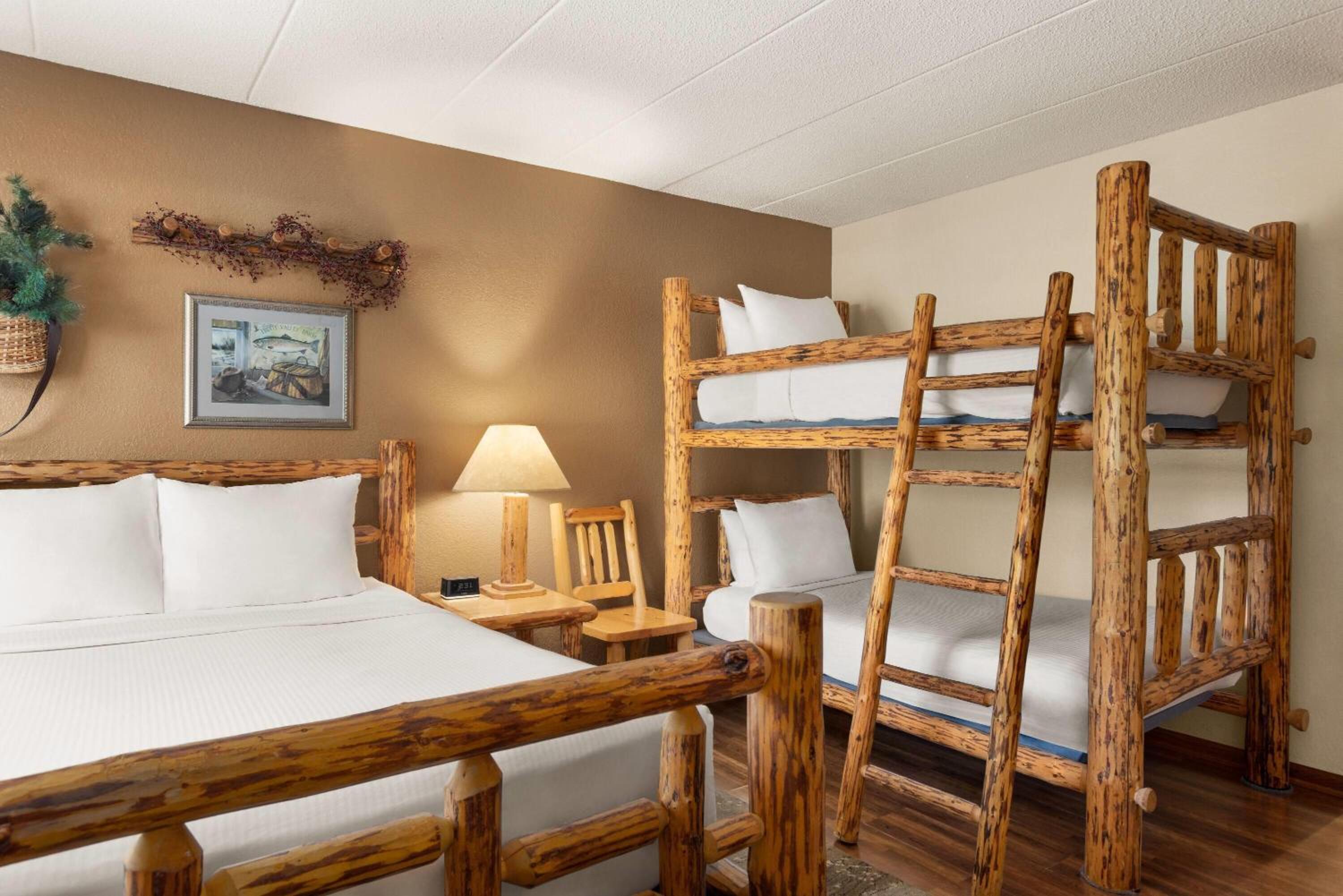 Suite with One Queen and Two Twin Beds - Non-Smoking - Photo 1