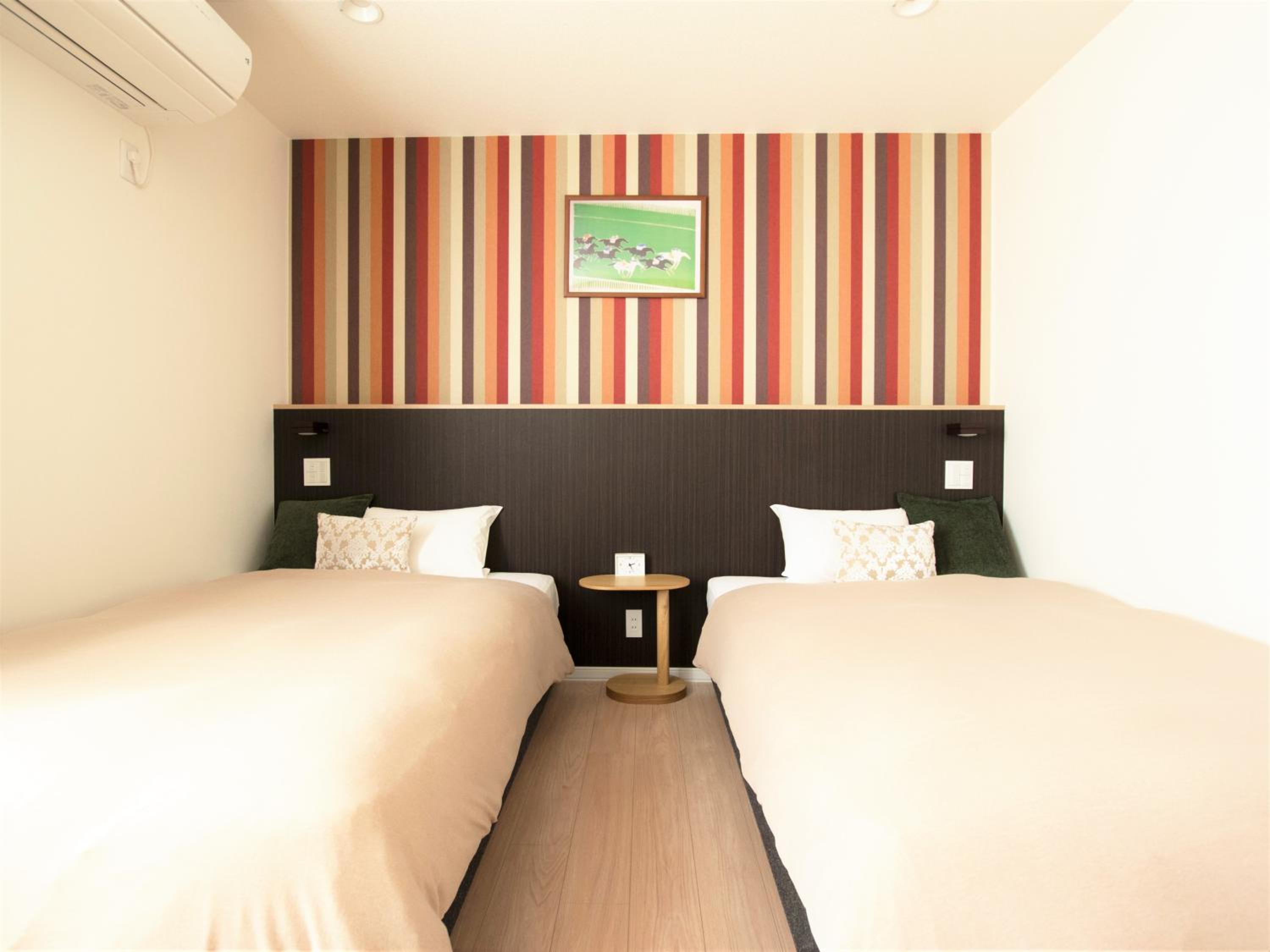 Twin Room with Private Bathroom photo 1