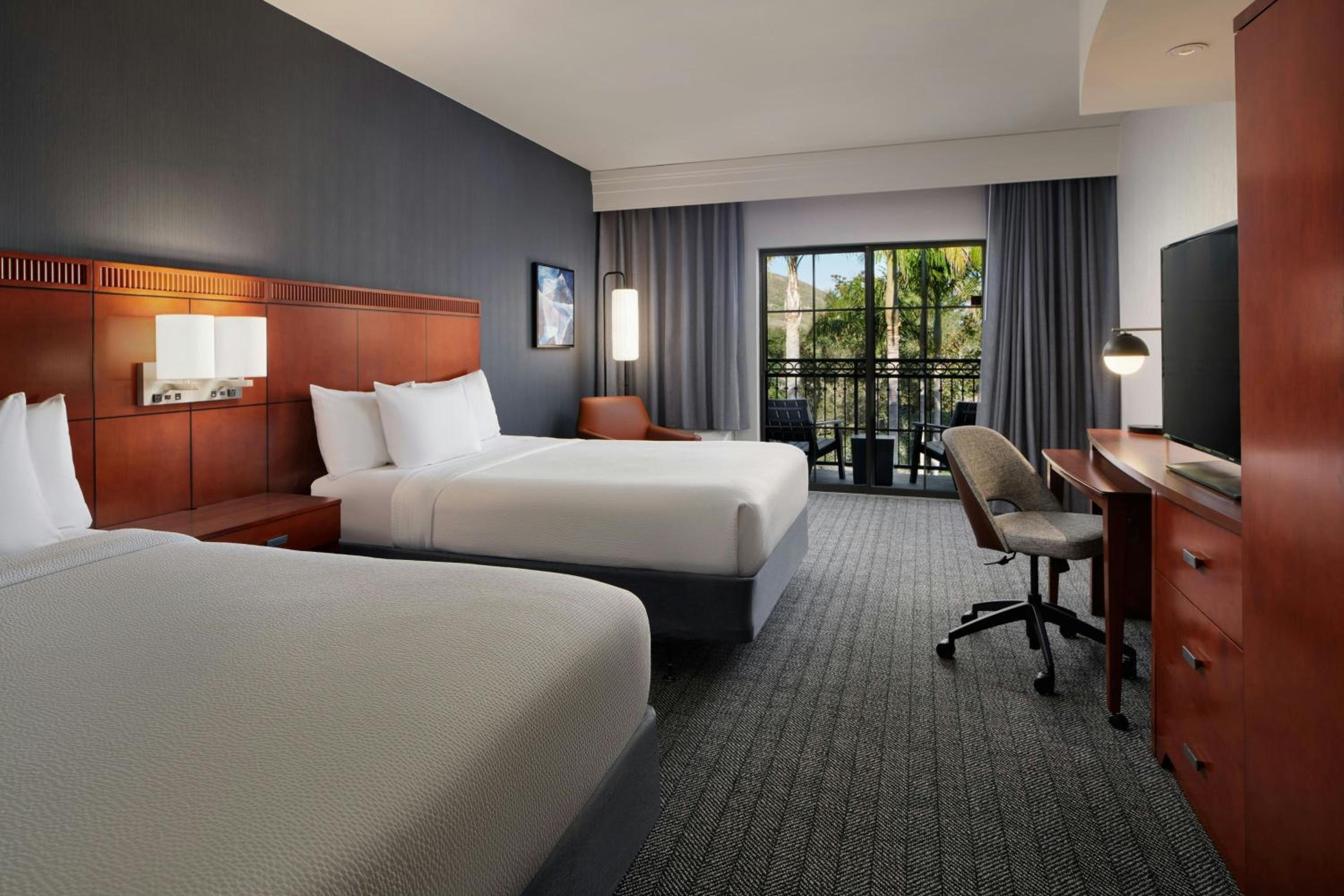 Queen Room with Two Queen Beds - Hearing Accessible - Photo 1
