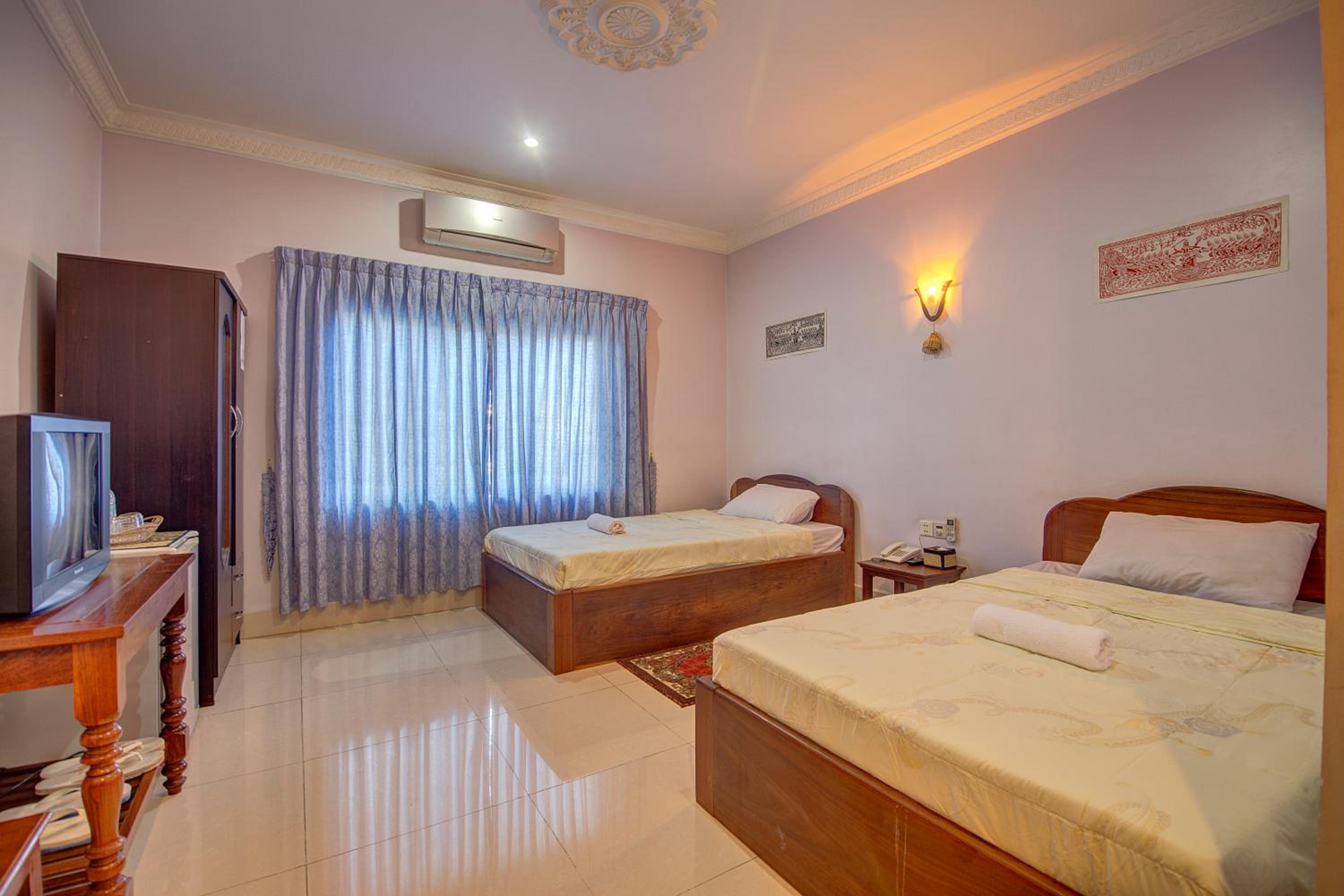 Standard Twin Room - Photo 4