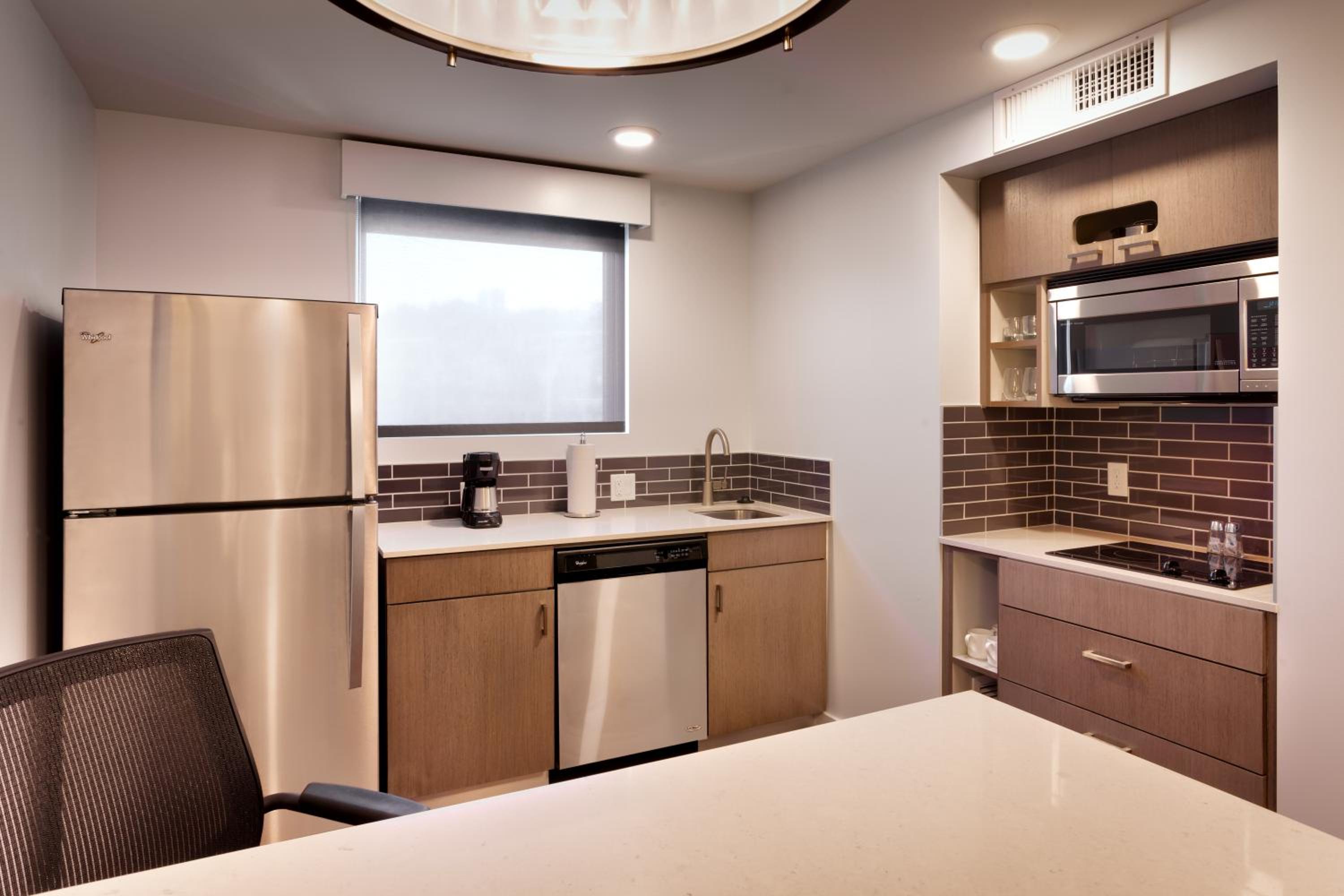 Kitchen in the One-Bedroom King Suite with Sofa Bed and Kitchen at Hyatt House Portland / Downtown