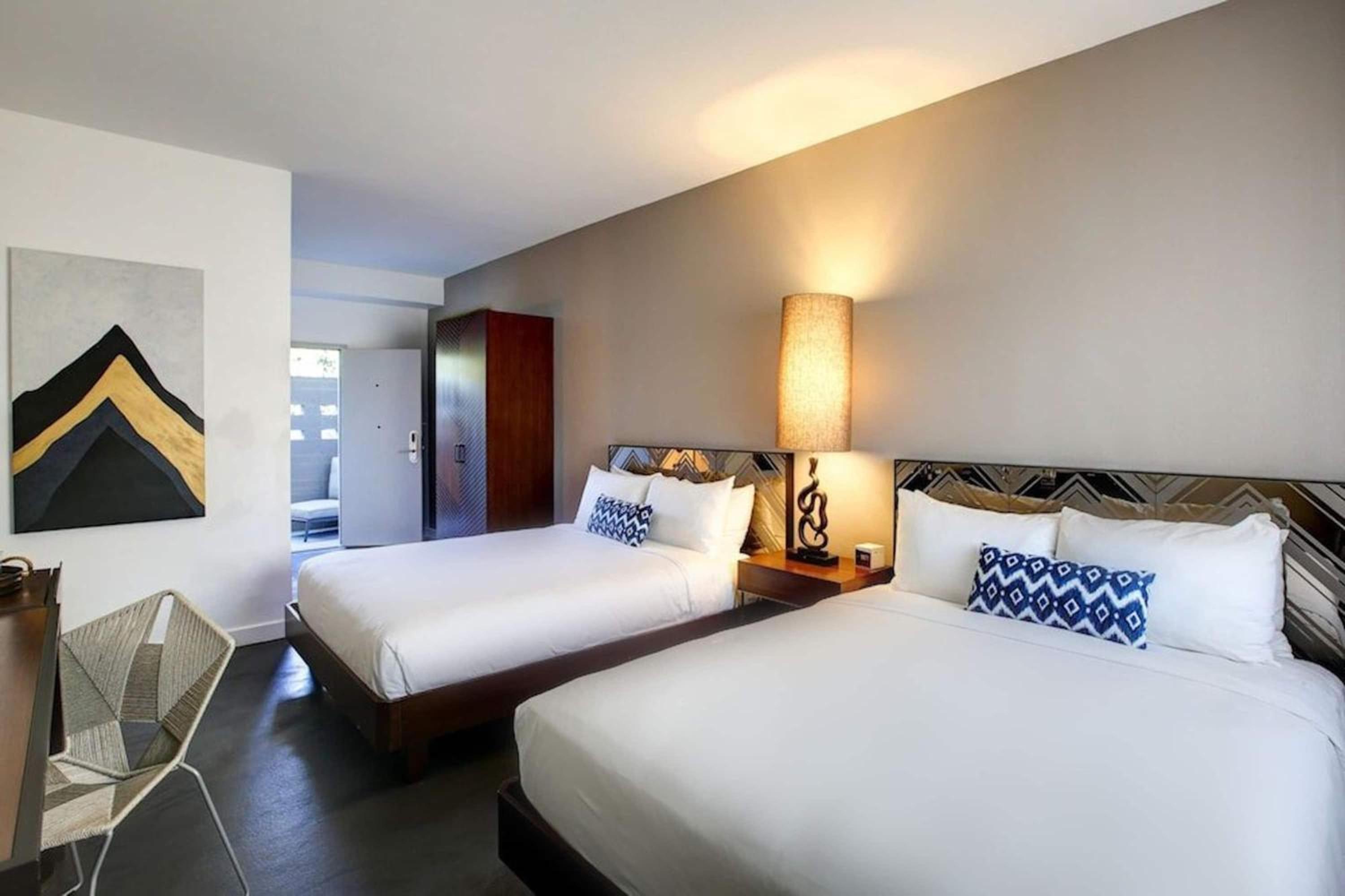 Deluxe Queen Room with Two Queen Beds and Pool View - Non-Smoking photo 3