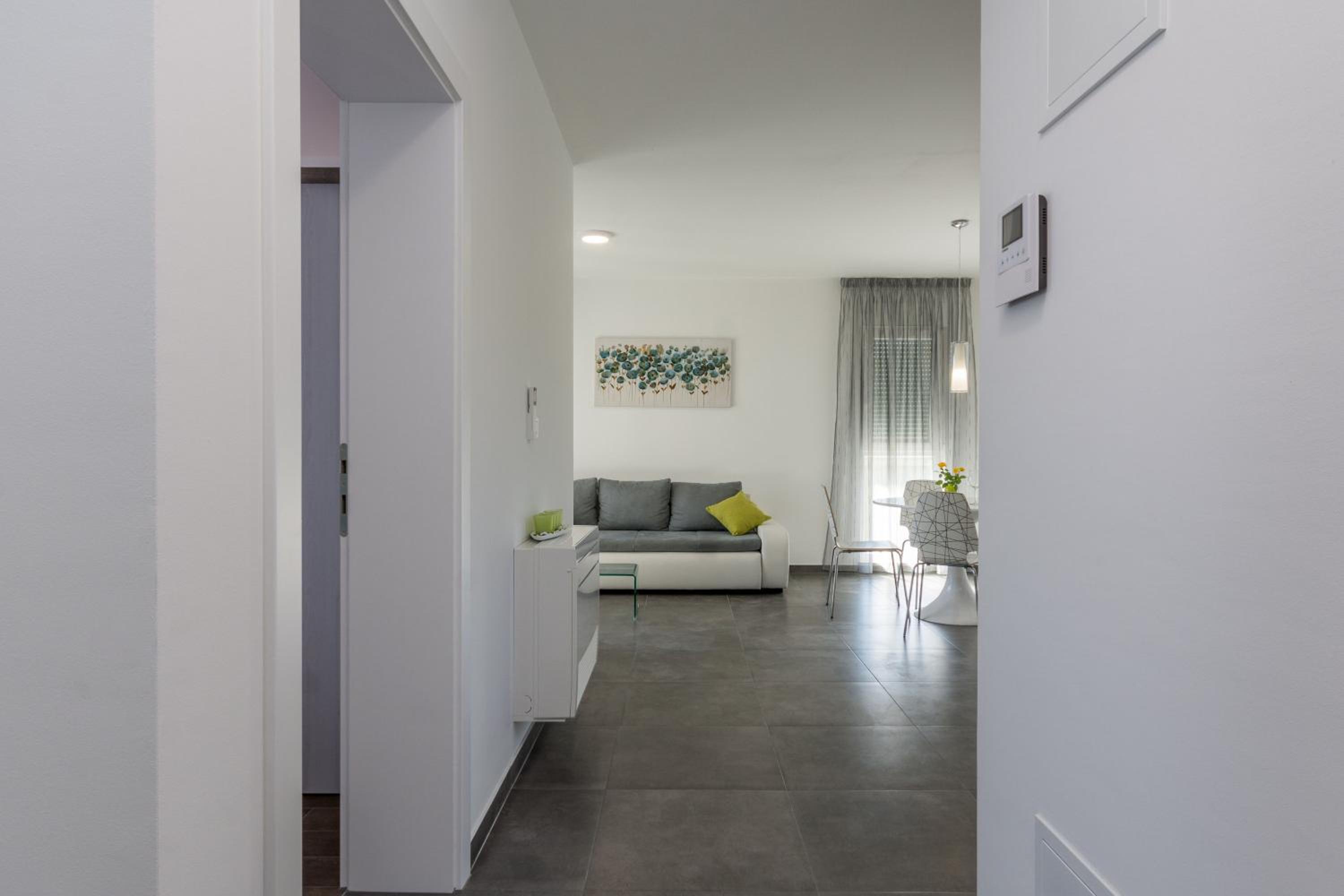 One-Bedroom Apartment with Balcony and Sea View