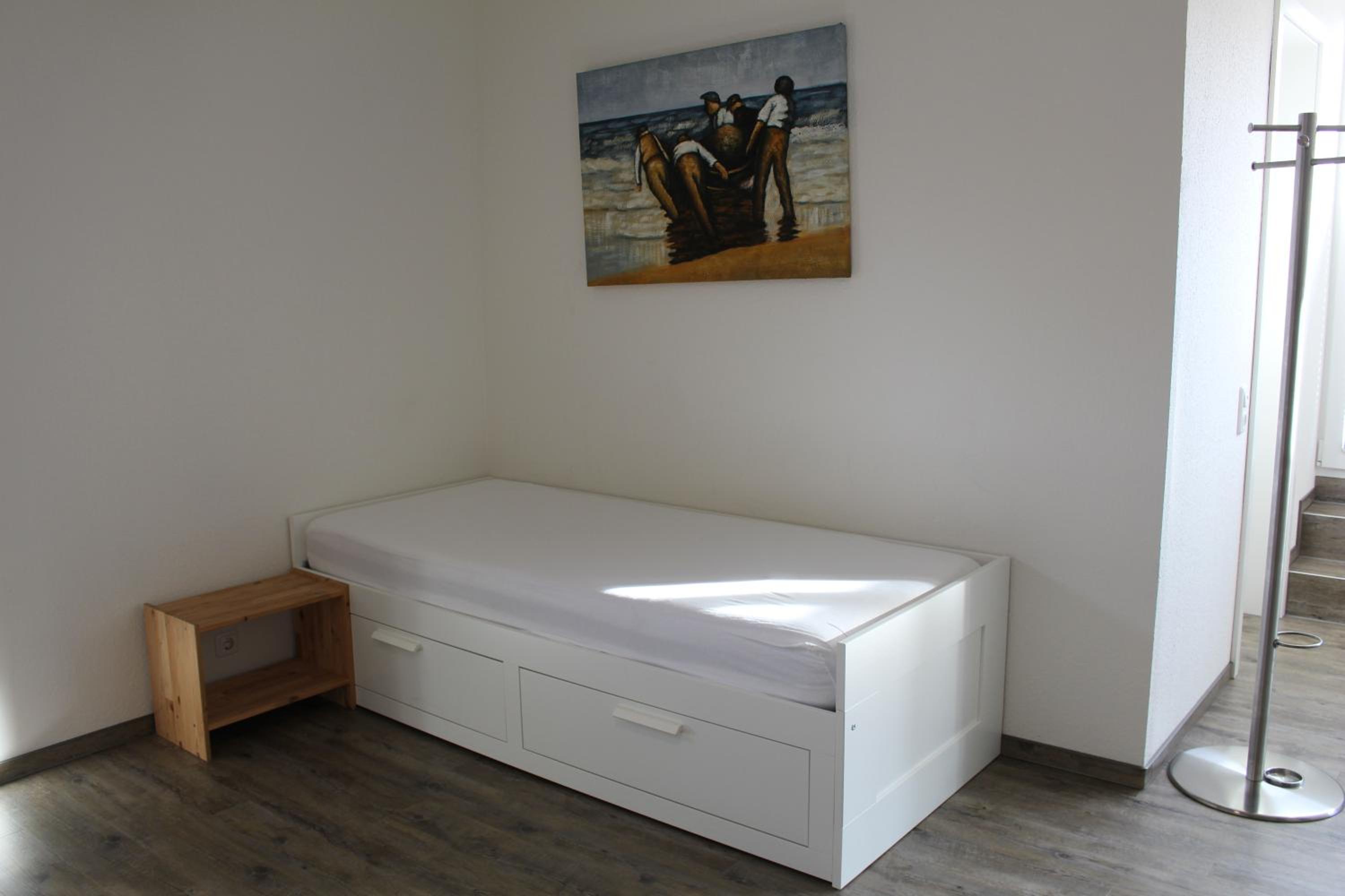 Basic Quadruple Room (2 Adults + 2 Children) - Photo 9