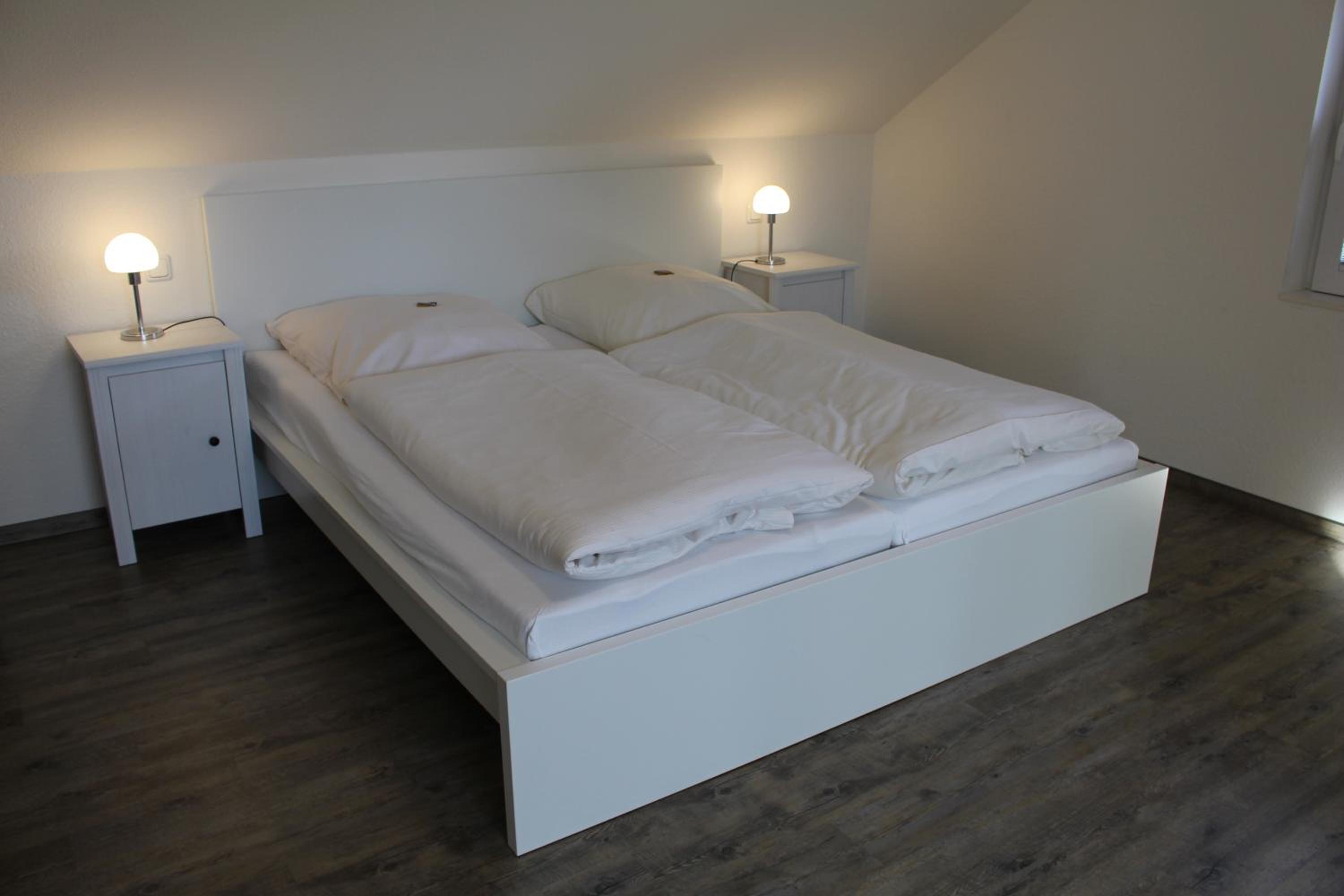 Basic Quadruple Room (2 Adults + 2 Children) - Photo 10