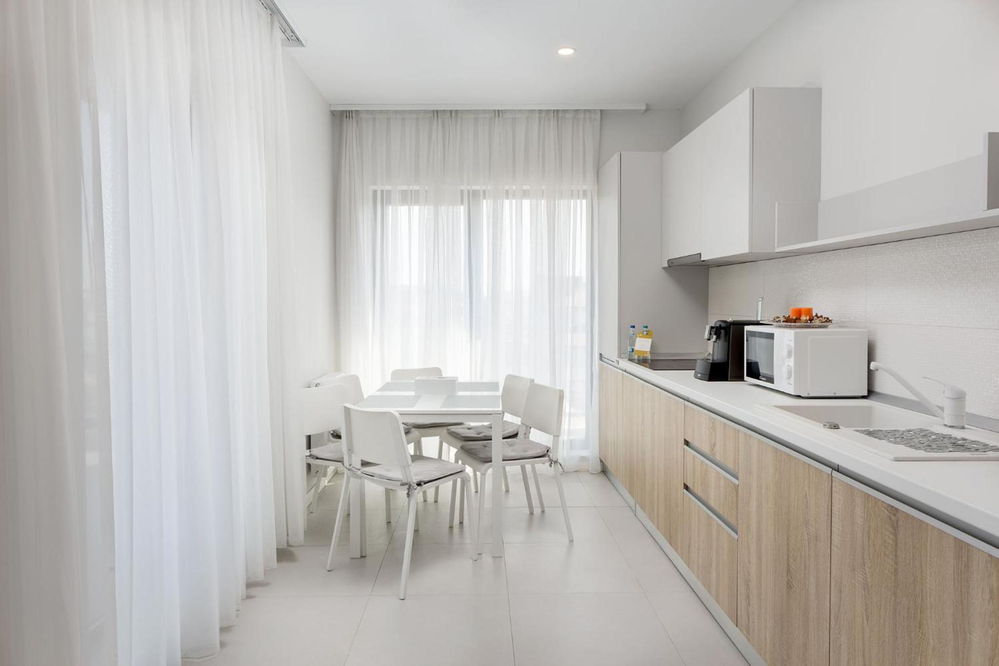 Three-Bedroom Apartment with Balcony photo 1