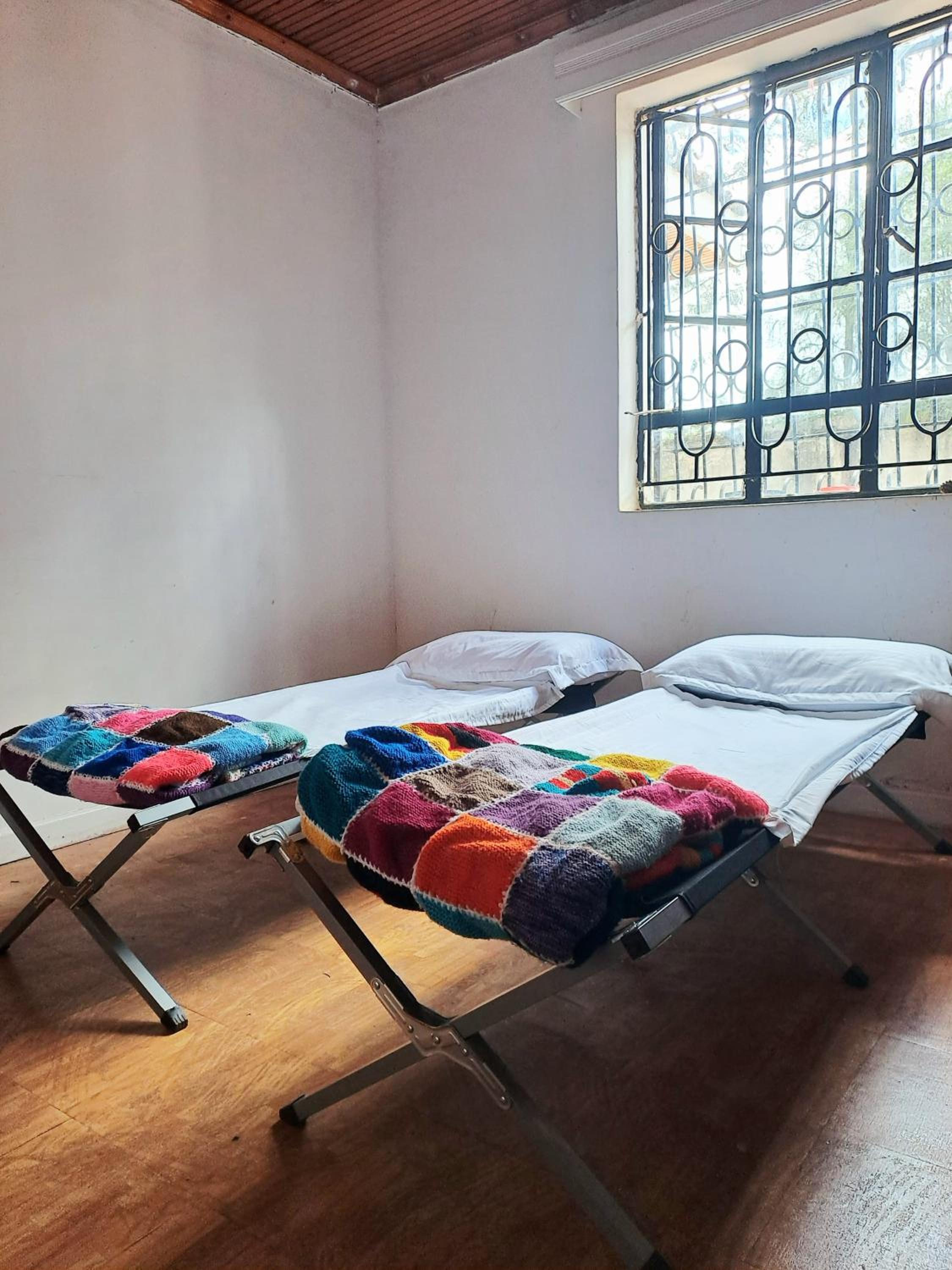 Single Bed in Dormitory Room