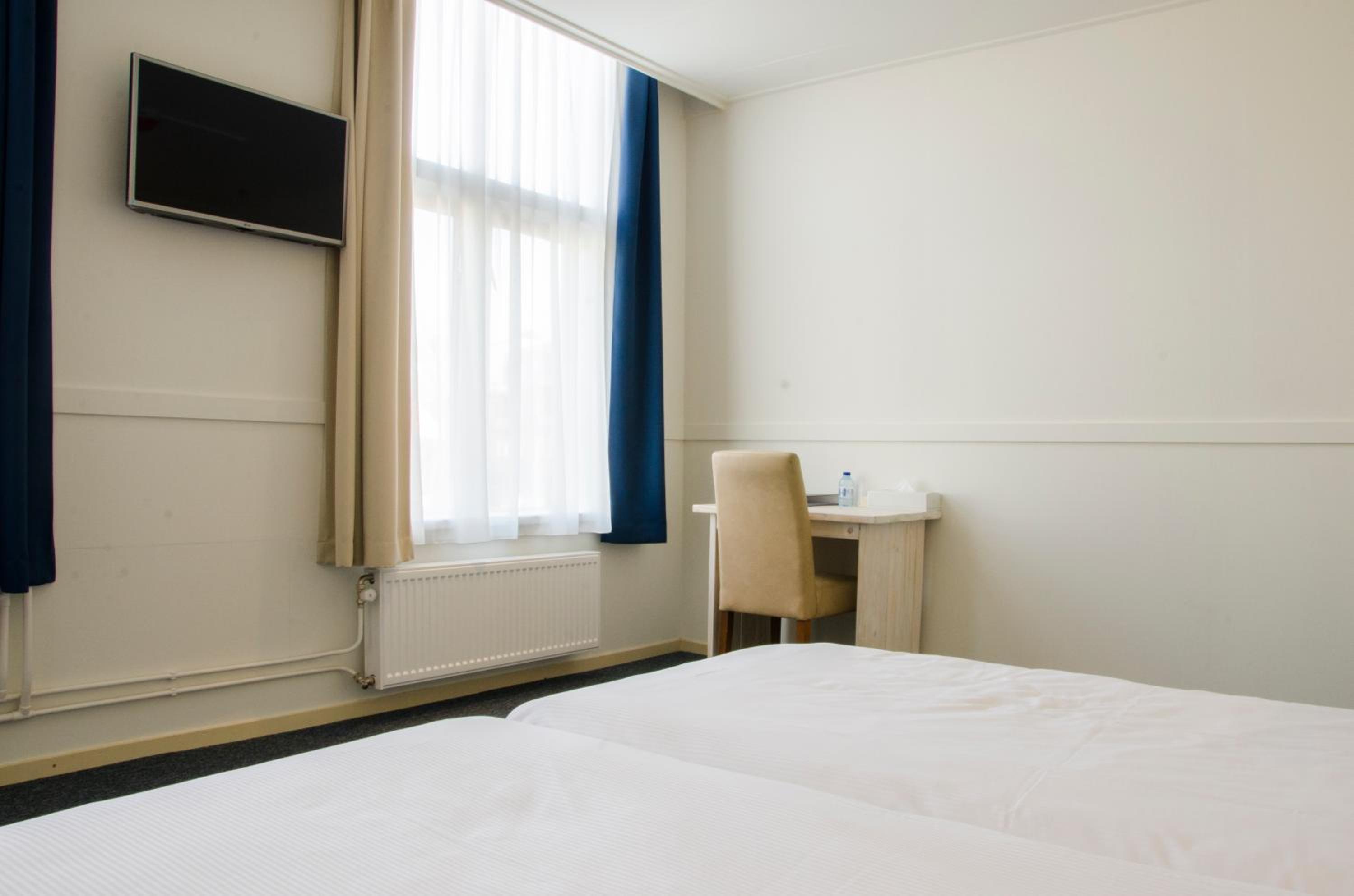 Standard Twin Room - Photo 10