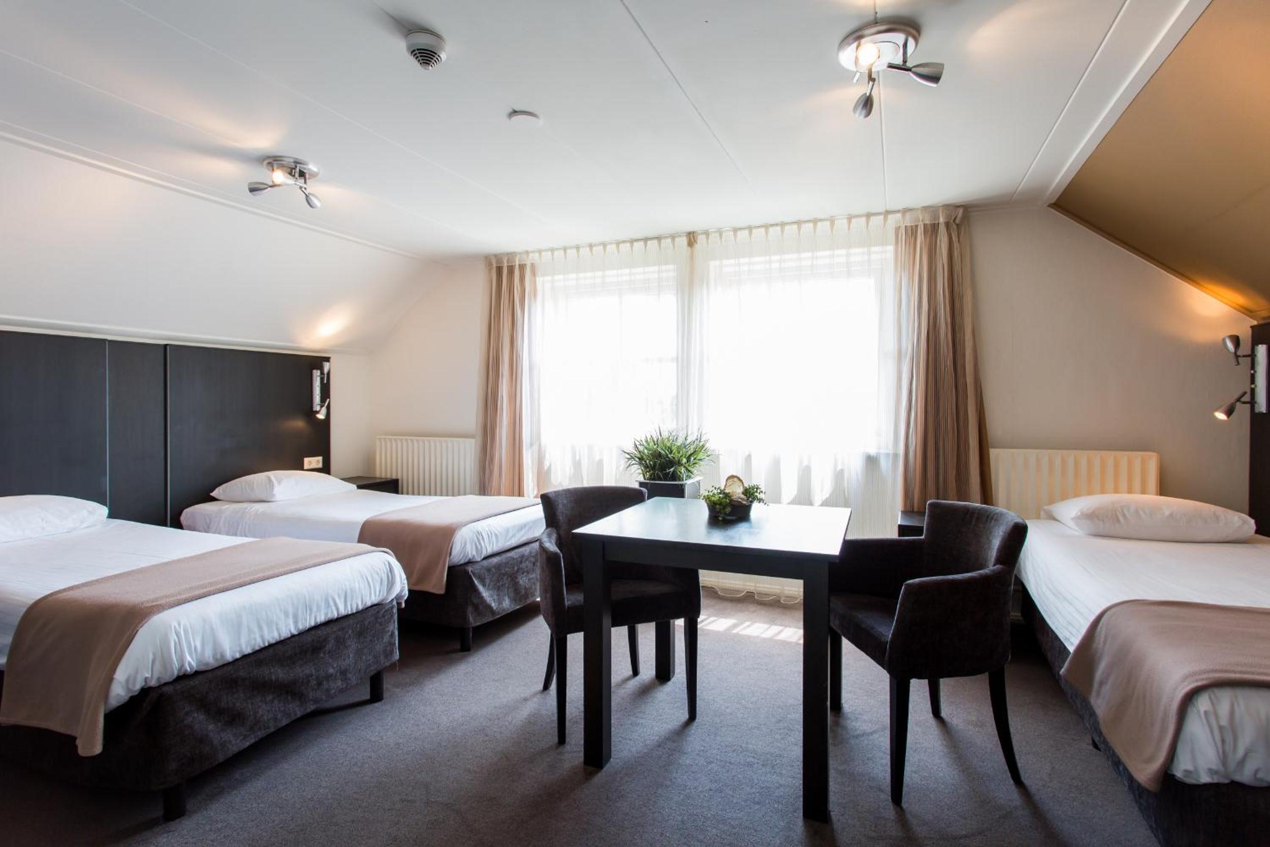 Triple Room - Photo 1