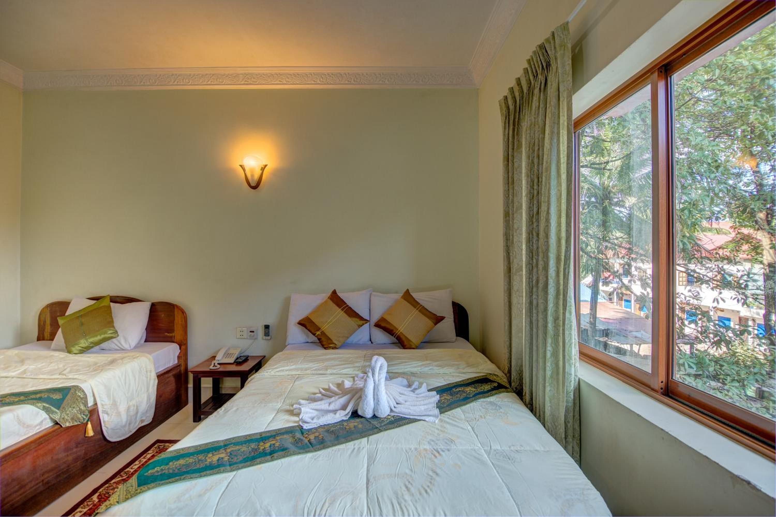 Standard Triple Room - Photo 7