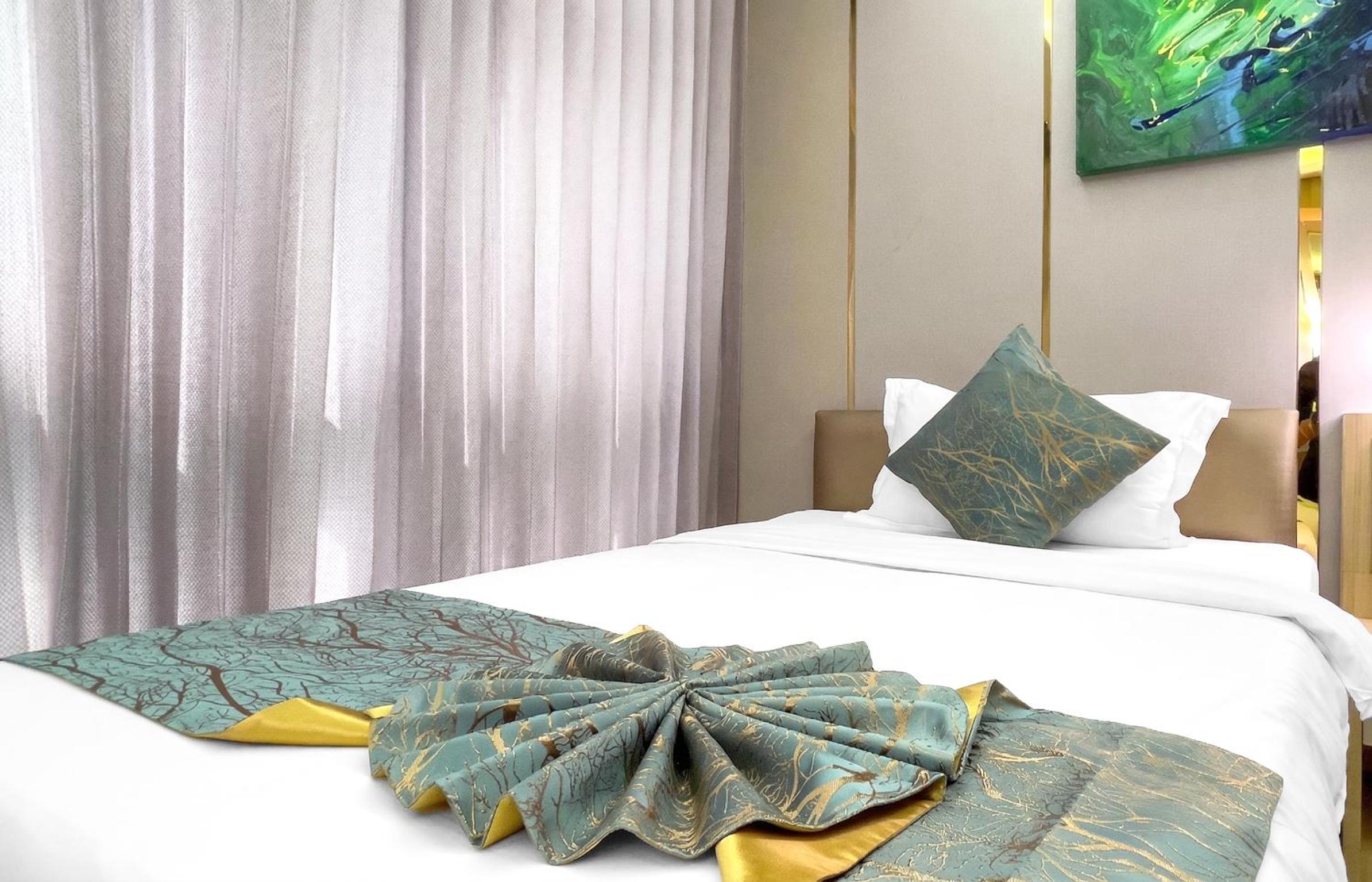 Deluxe Triple Room