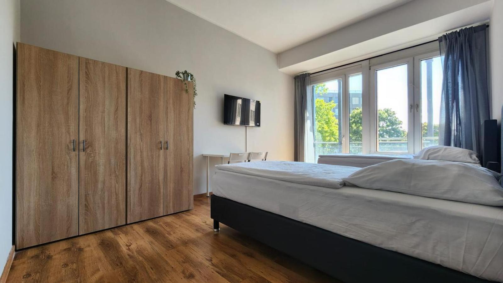 Three-Bedroom Apartment with Balcony