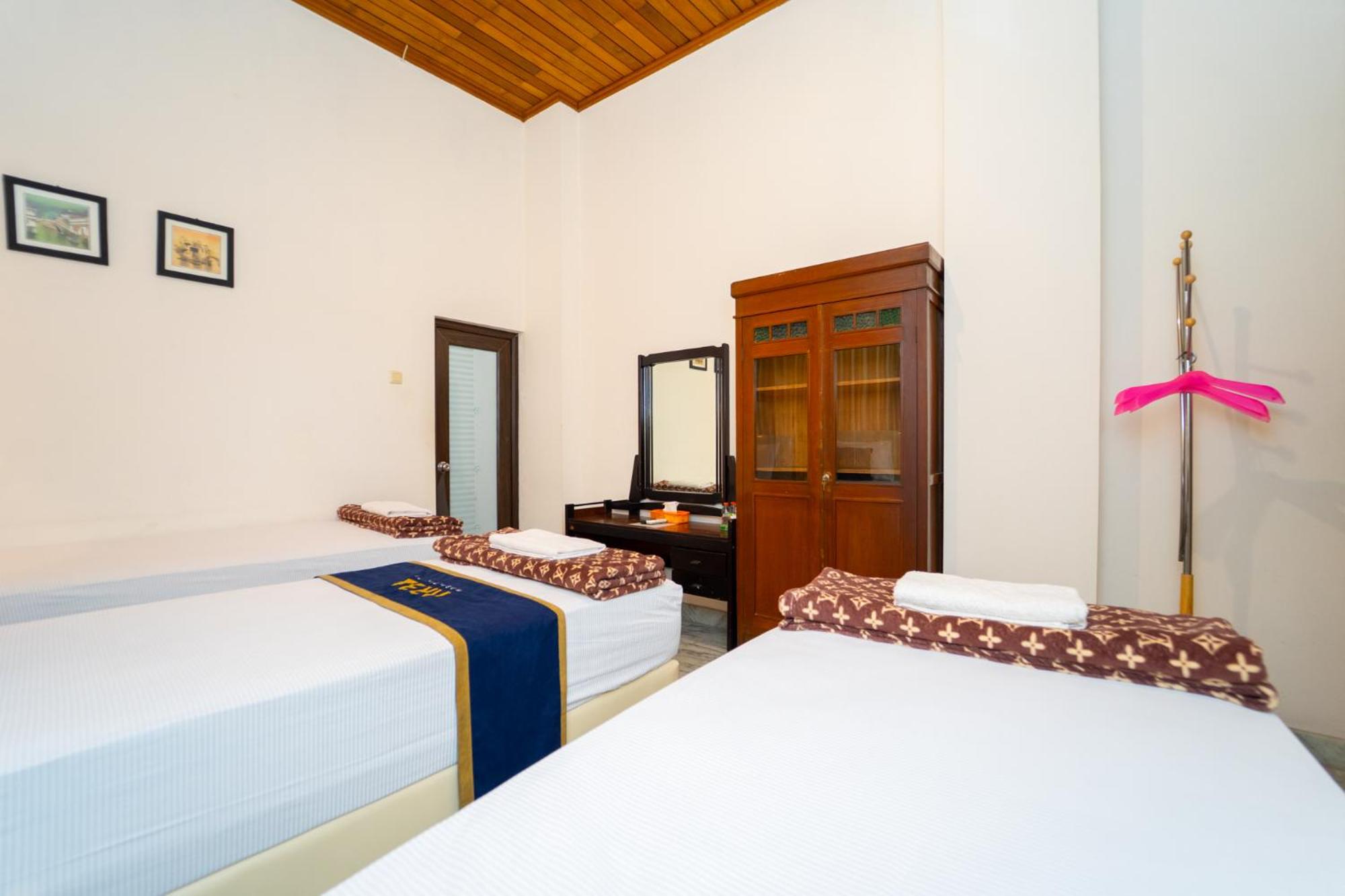 Deluxe Triple Room - Photo 6