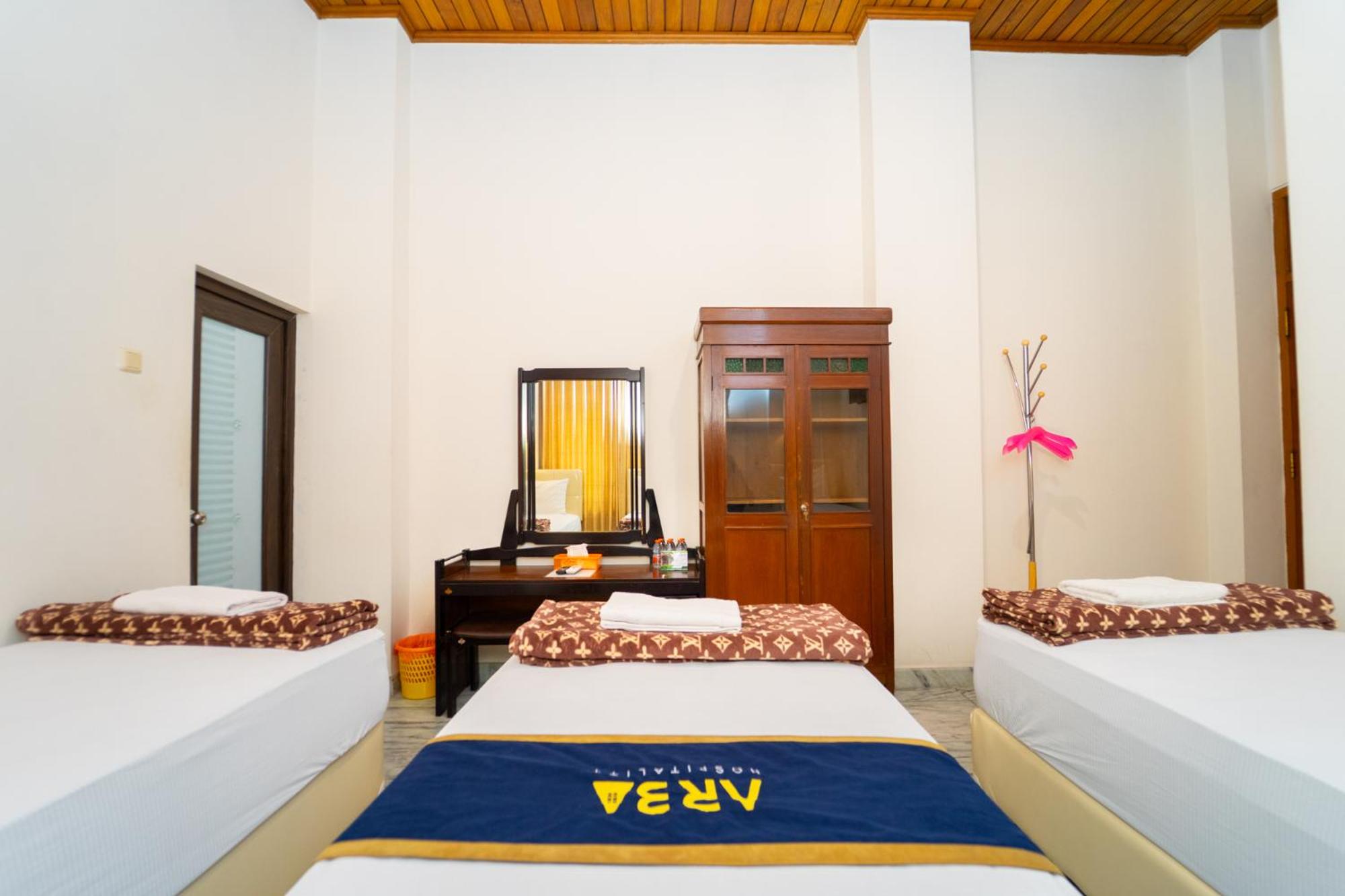 Deluxe Triple Room - Photo 7