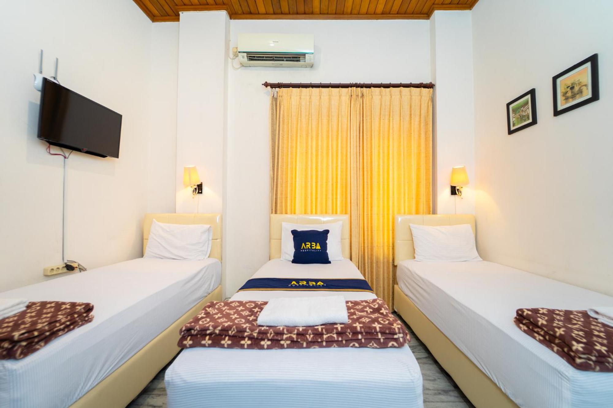 Deluxe Triple Room - Photo 8
