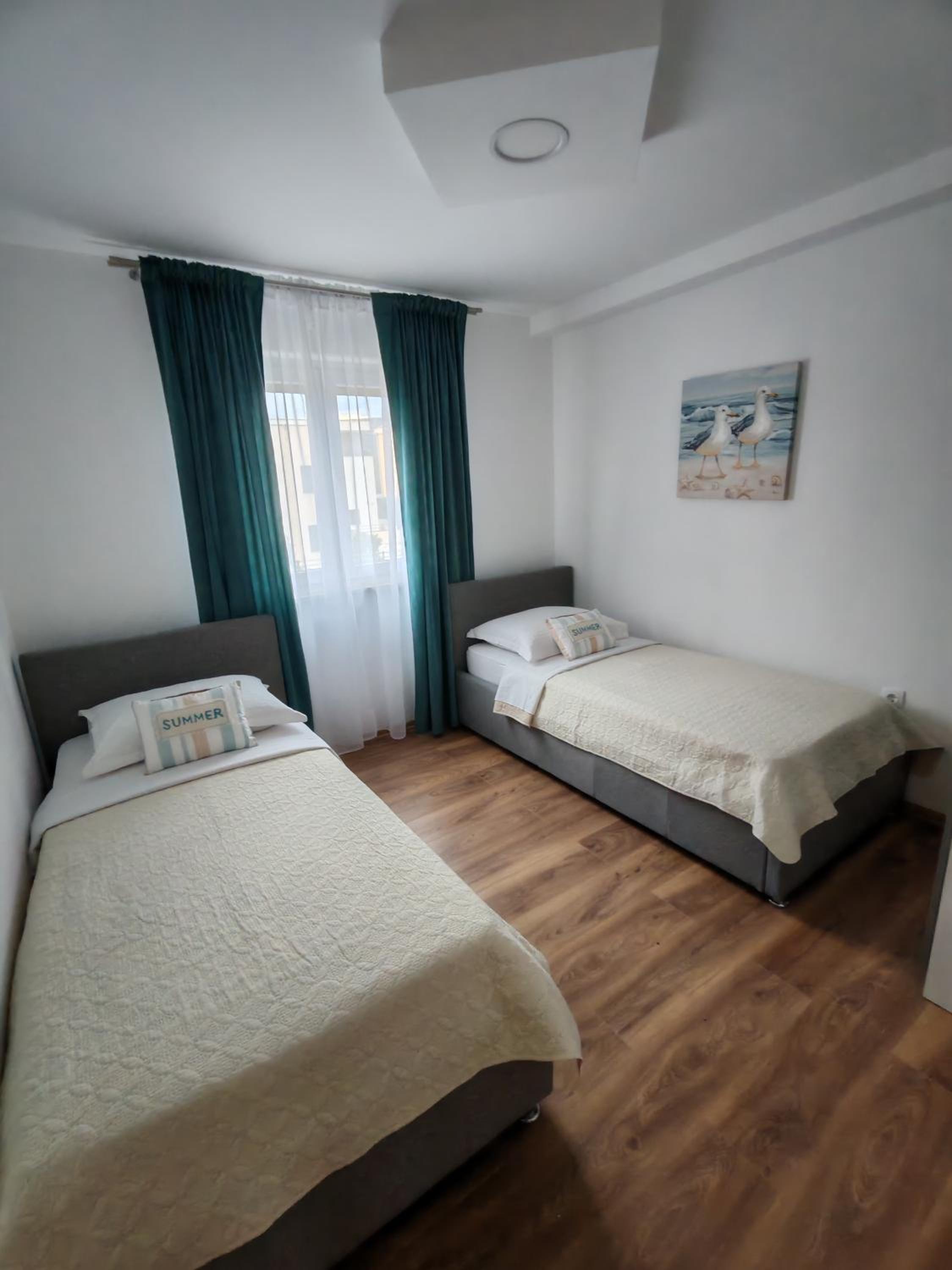 Two-Bedroom Apartment with Balcony and Sea View