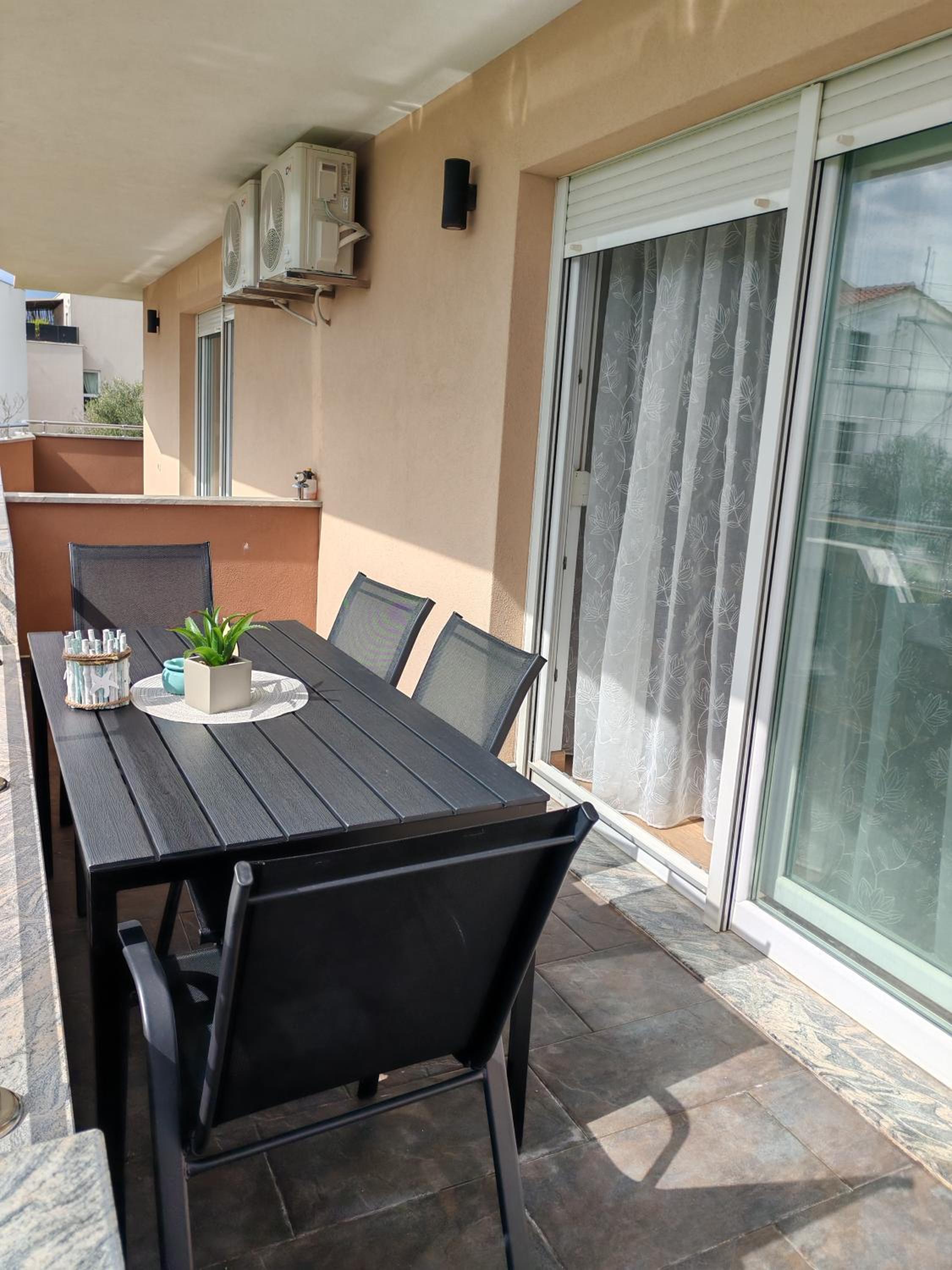 Two-Bedroom Apartment with Balcony and Sea View