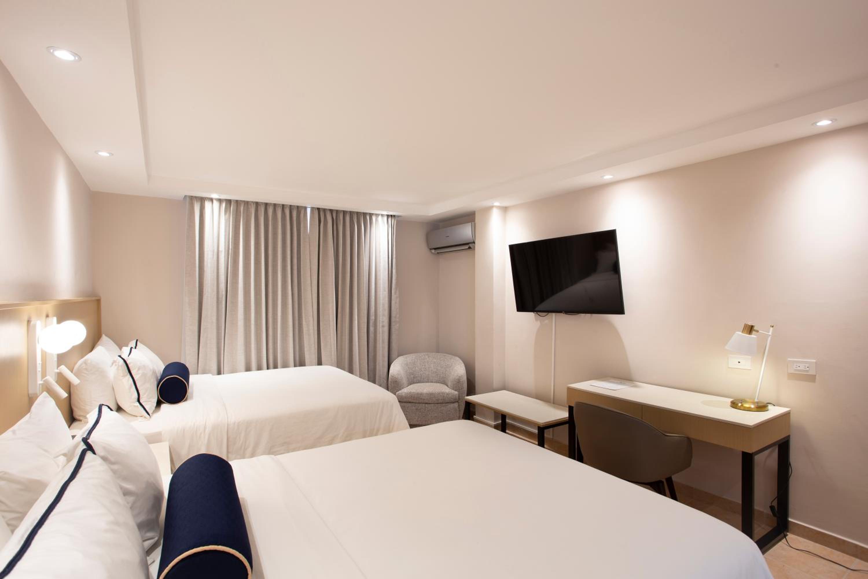 Queen Suite with Two Queen Beds, Sofa Bed and Living Room - Non-Smoking